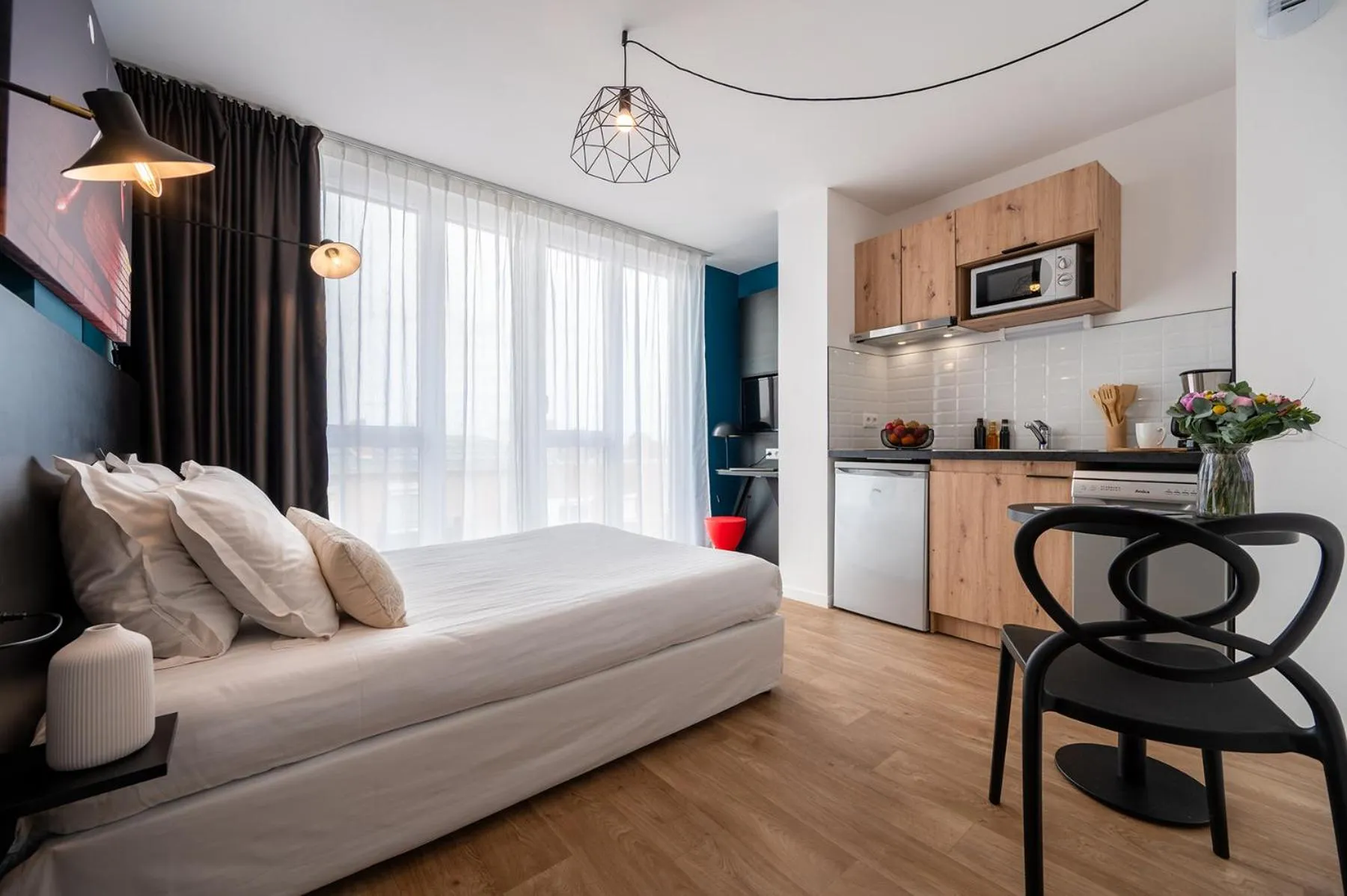 Bedroom in Nemea Appart Hotel Coliseum Amiens Centre