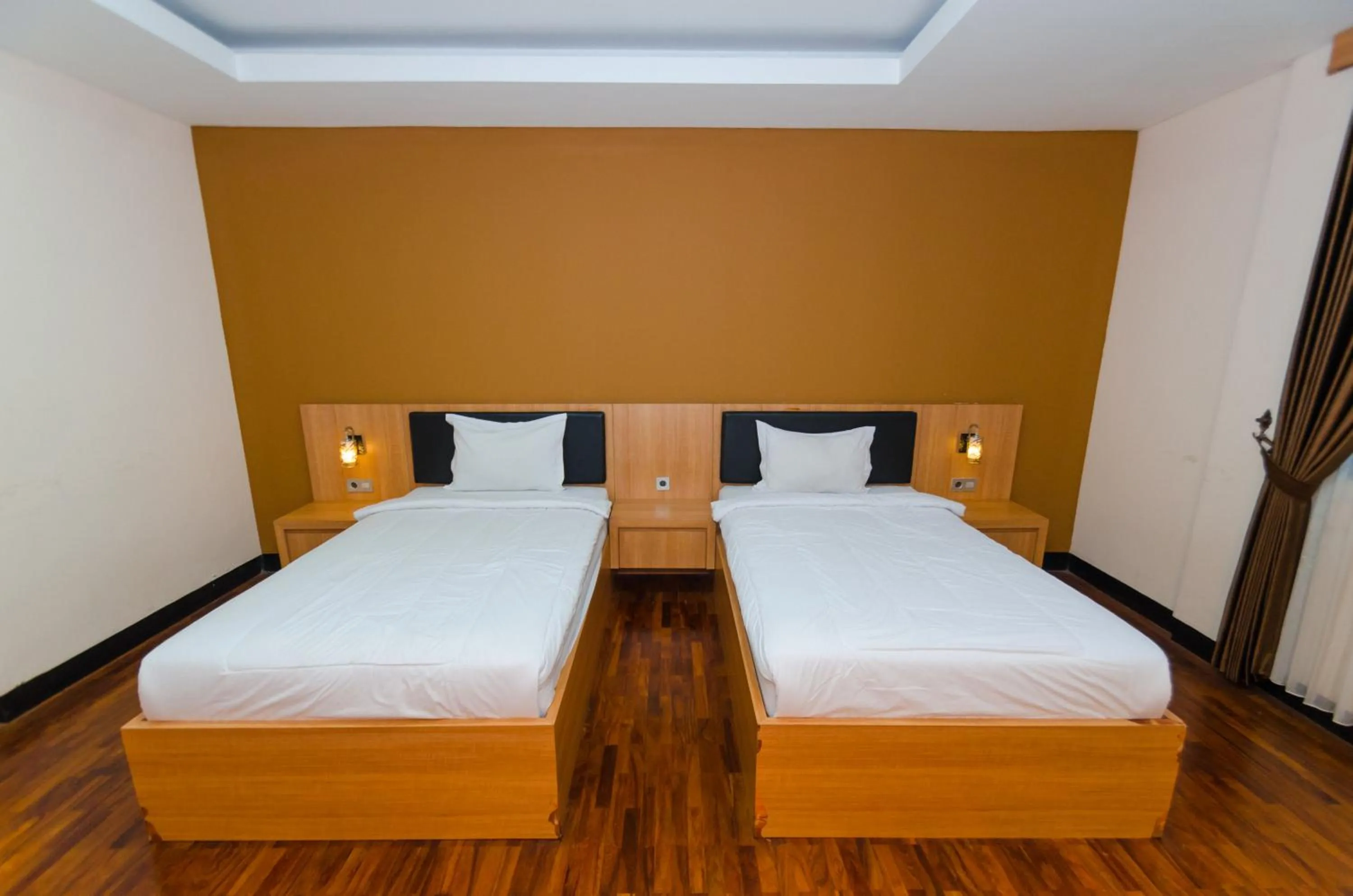 Bed in Graha Widya Bhakti at STIESIA Surabaya