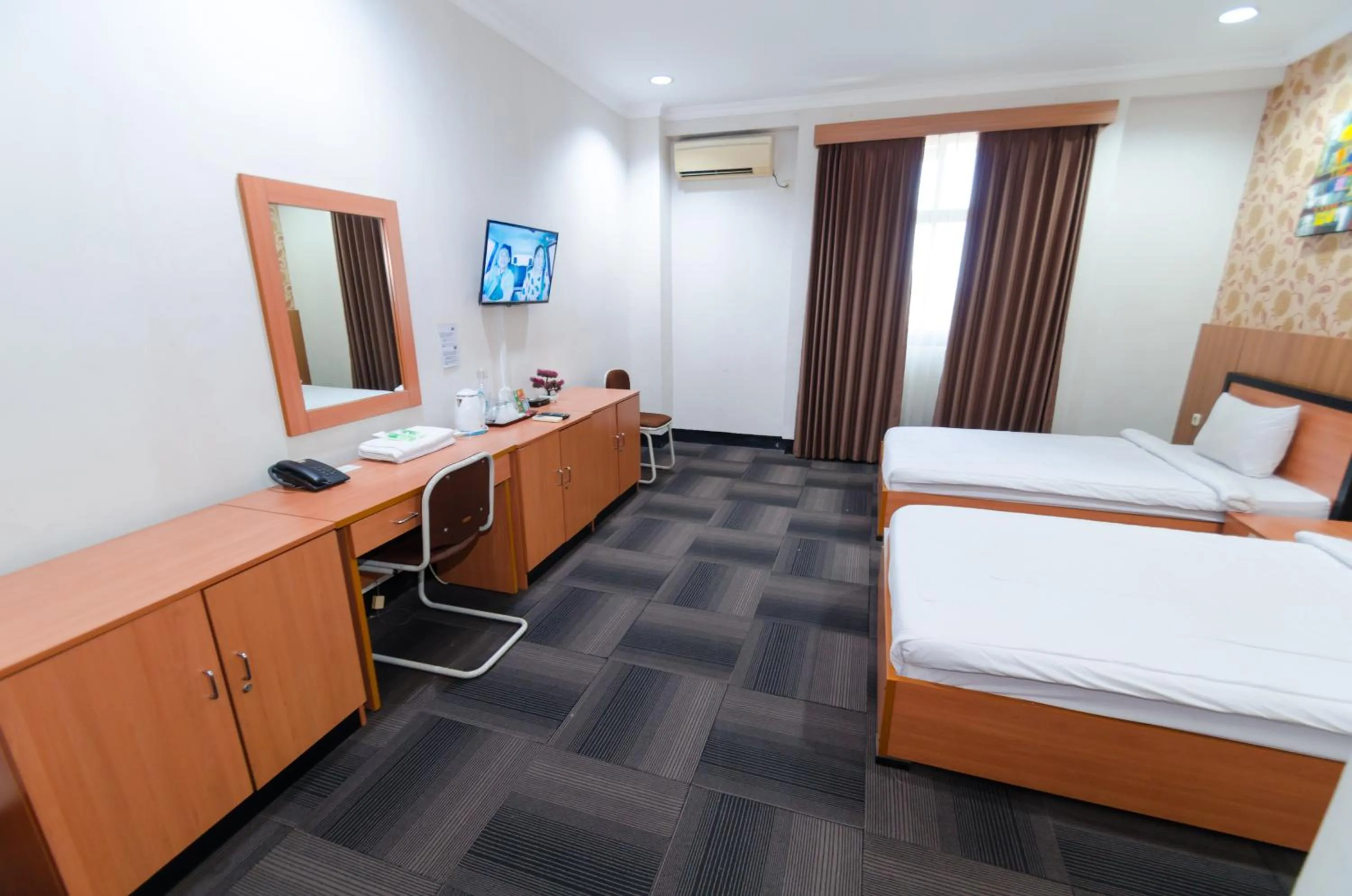 TV and multimedia, Bed in Graha Widya Bhakti at STIESIA Surabaya