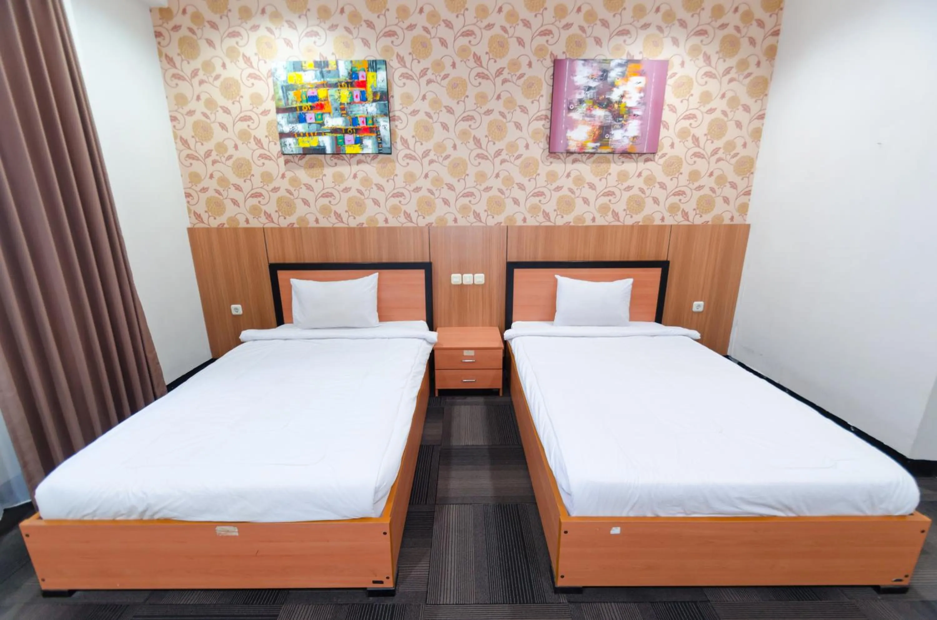 Bed in Graha Widya Bhakti at STIESIA Surabaya