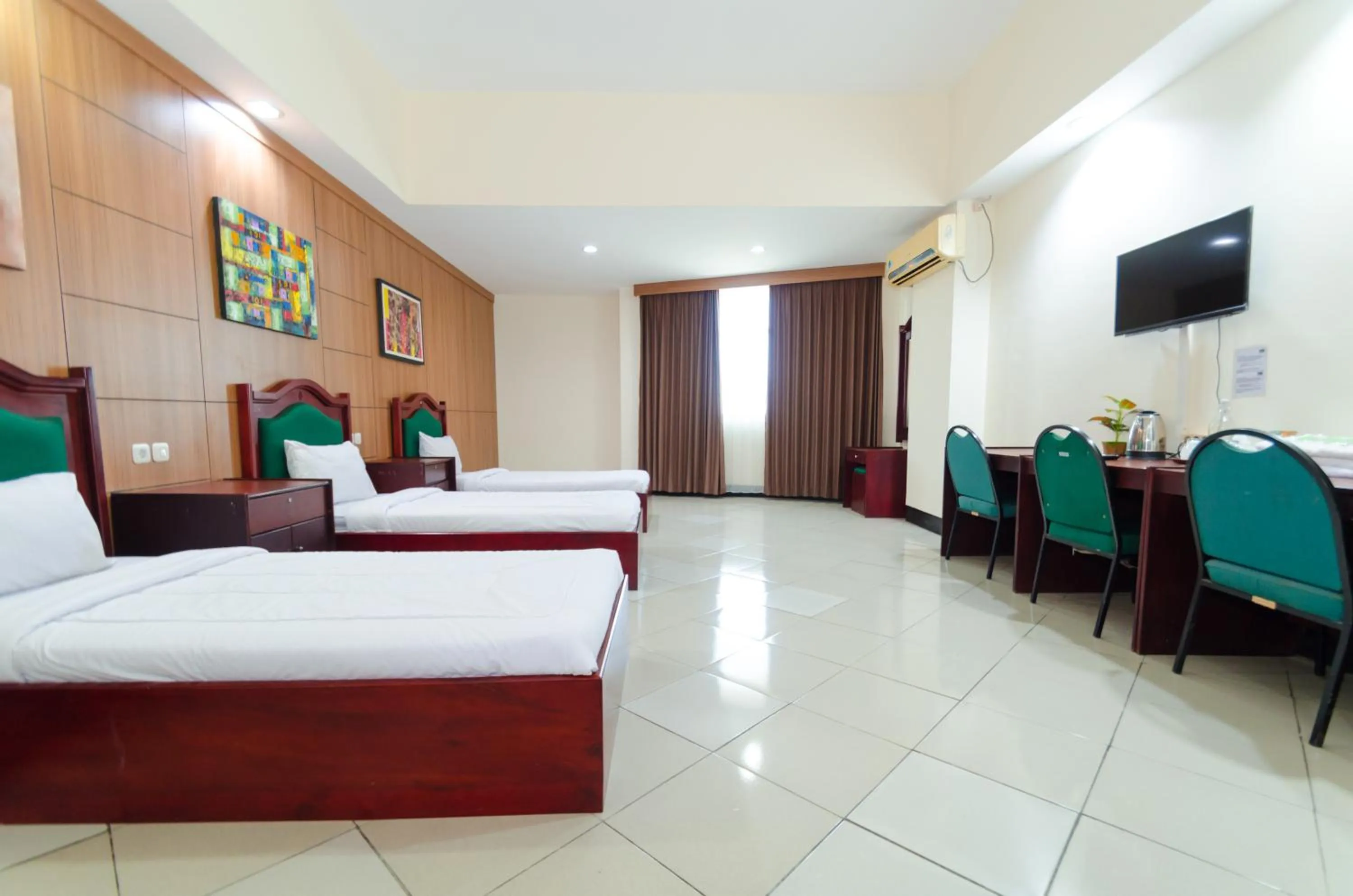 Bed in Graha Widya Bhakti at STIESIA Surabaya