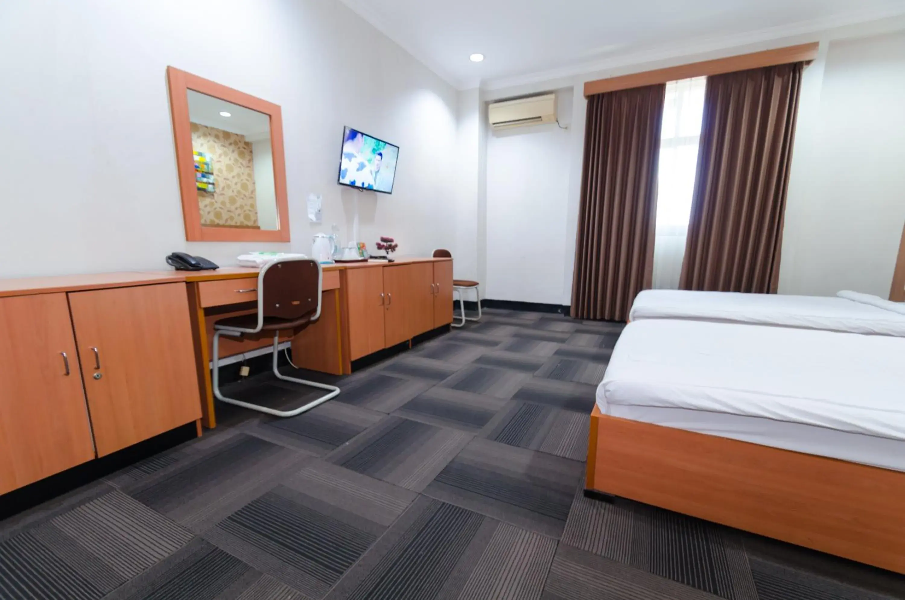 Bed in Graha Widya Bhakti at STIESIA Surabaya Bed in Graha Widya Bhakti at STIESIA Surabaya