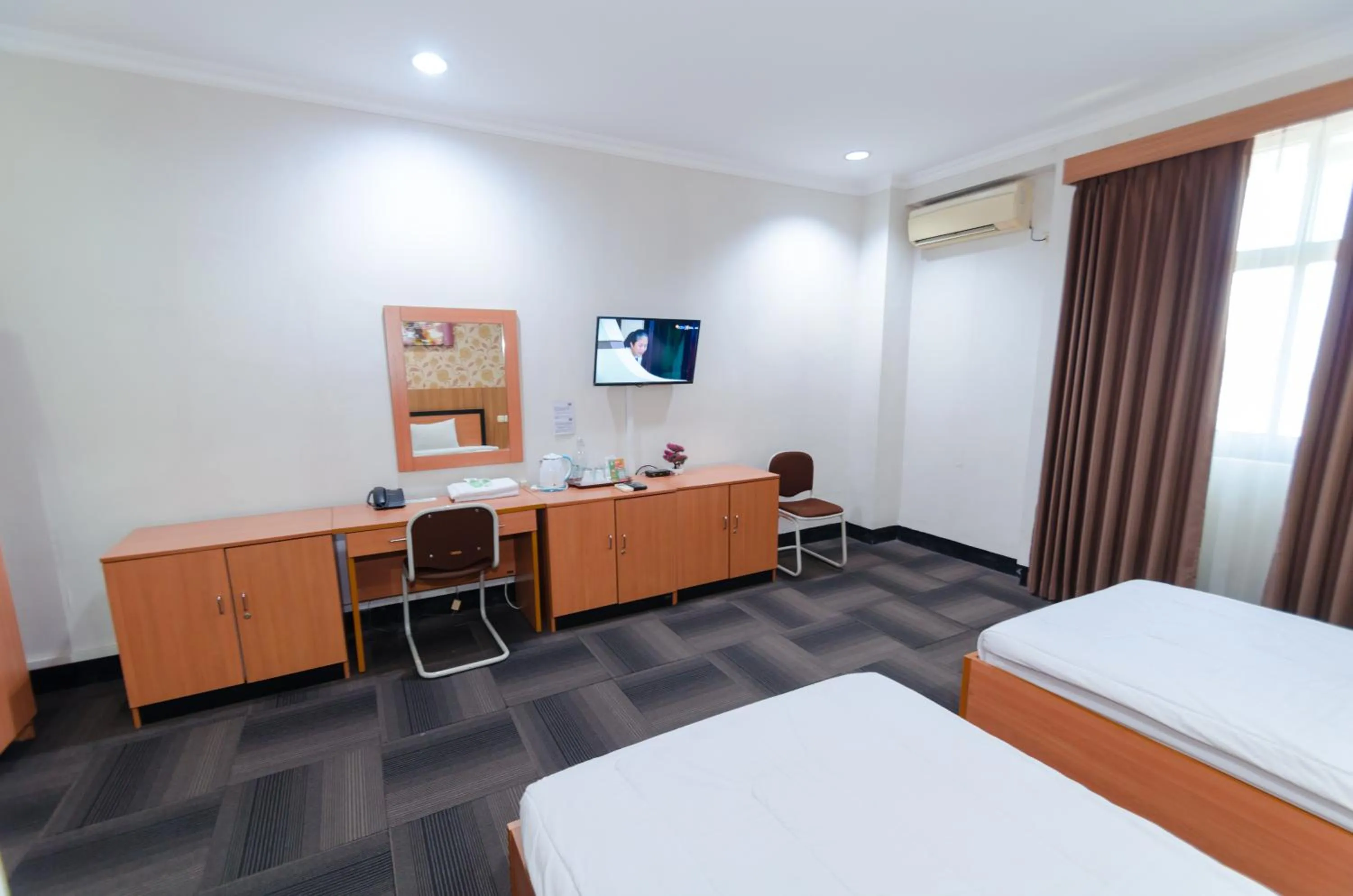 Bed in Graha Widya Bhakti at STIESIA Surabaya