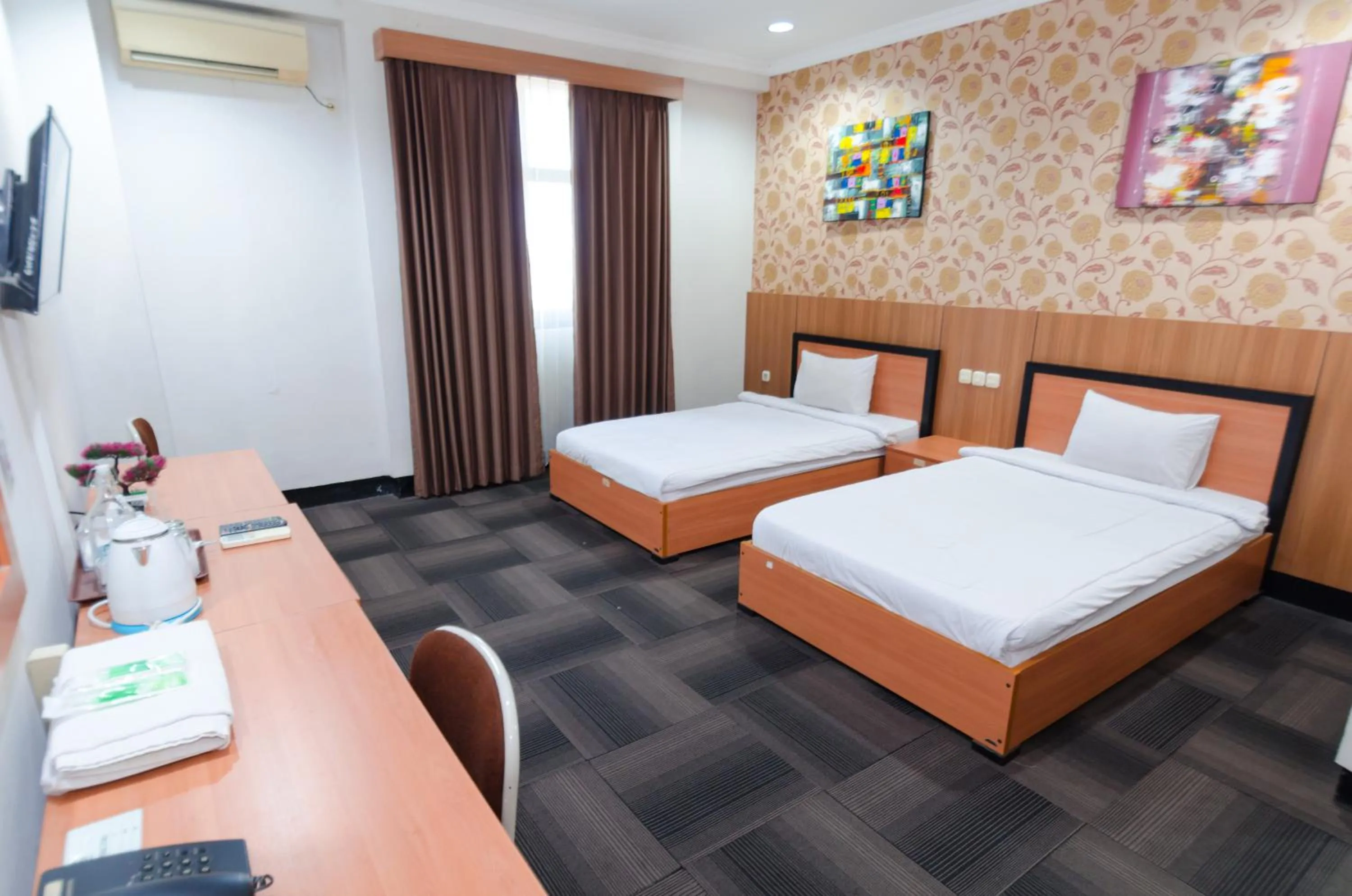 Bed in Graha Widya Bhakti at STIESIA Surabaya