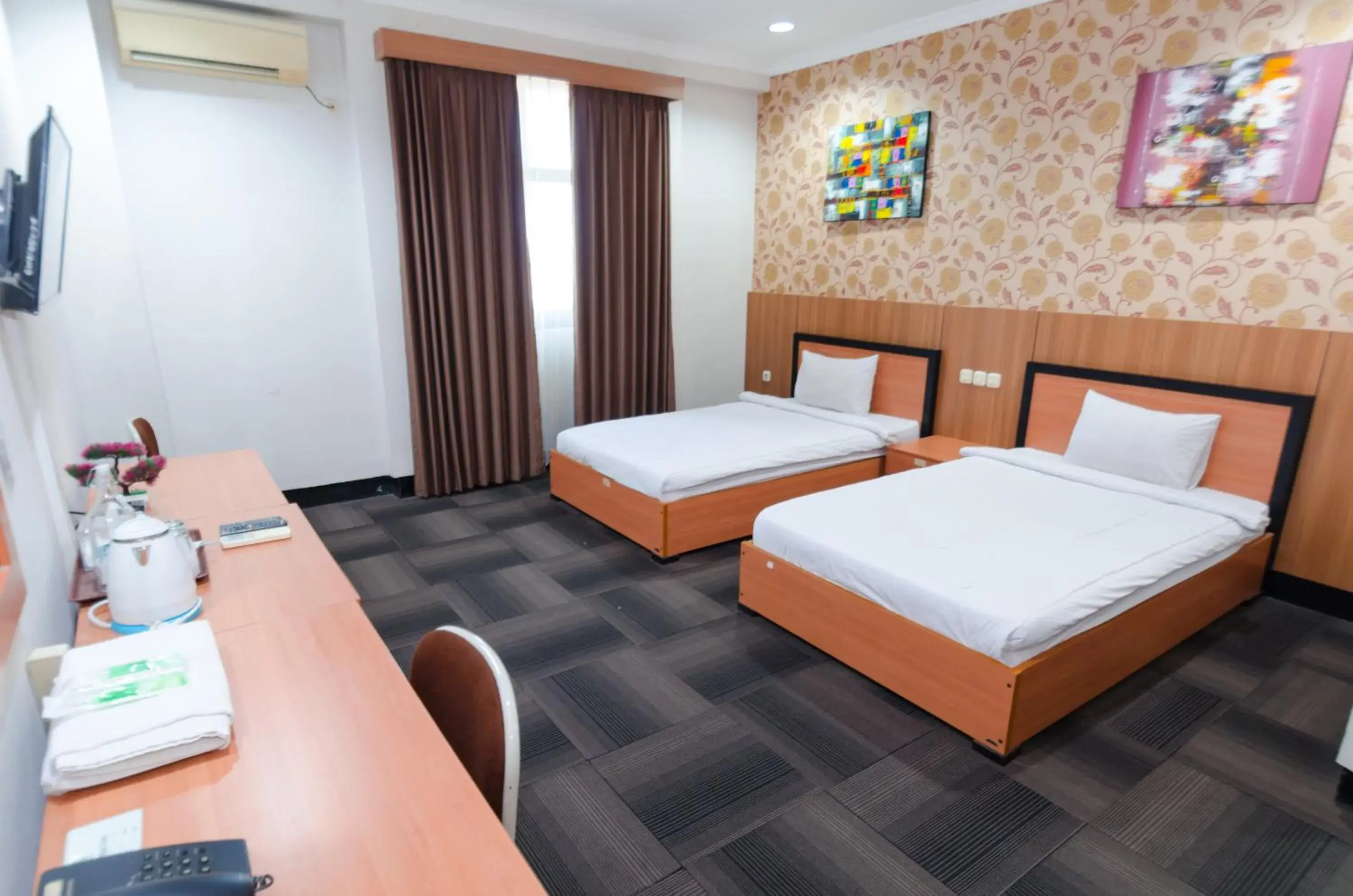 Bed in Graha Widya Bhakti at STIESIA Surabaya Bed in Graha Widya Bhakti at STIESIA Surabaya