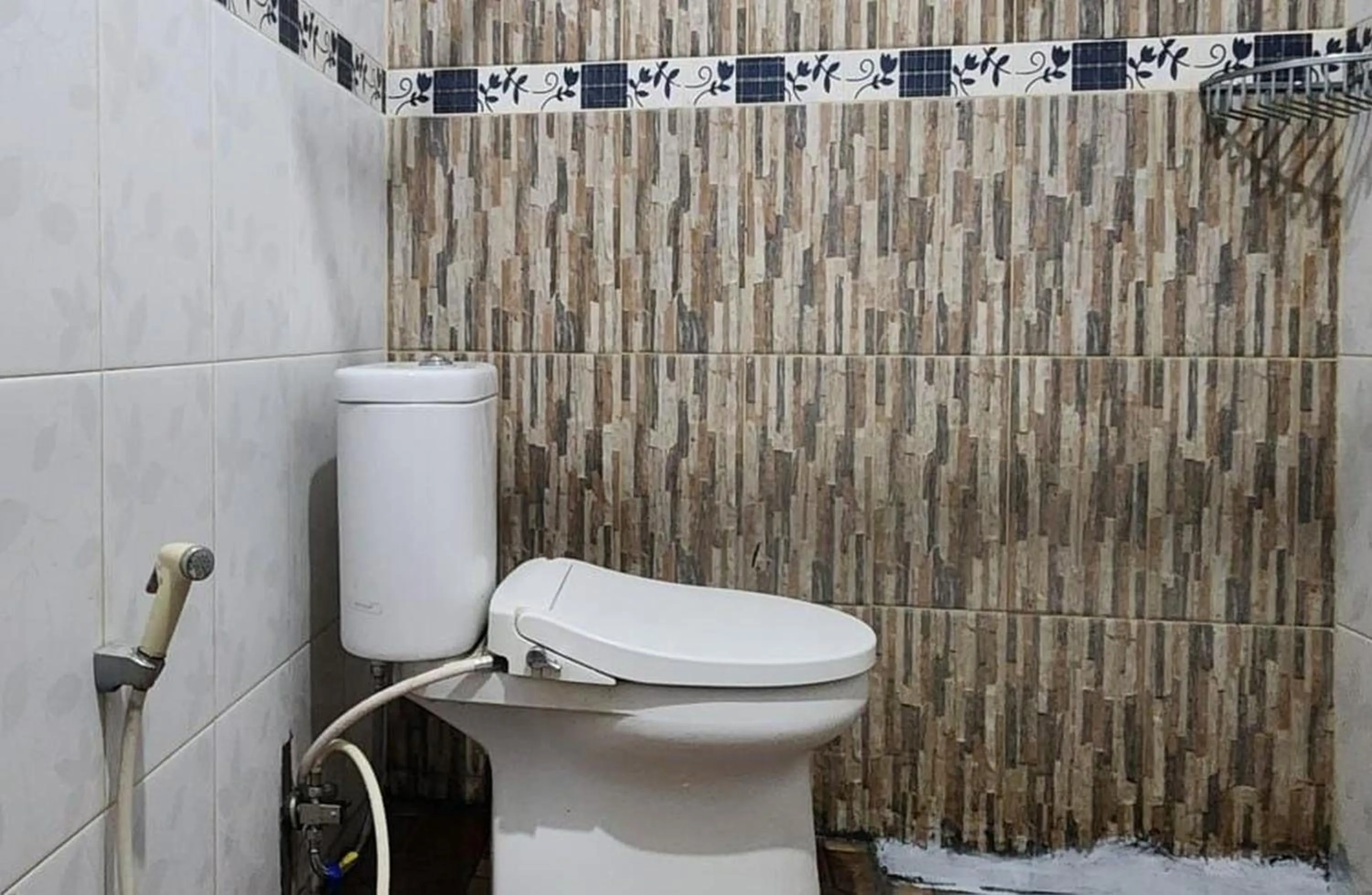 Bathroom in Permata Homestay Kotamobagu Mitra RedDoorz