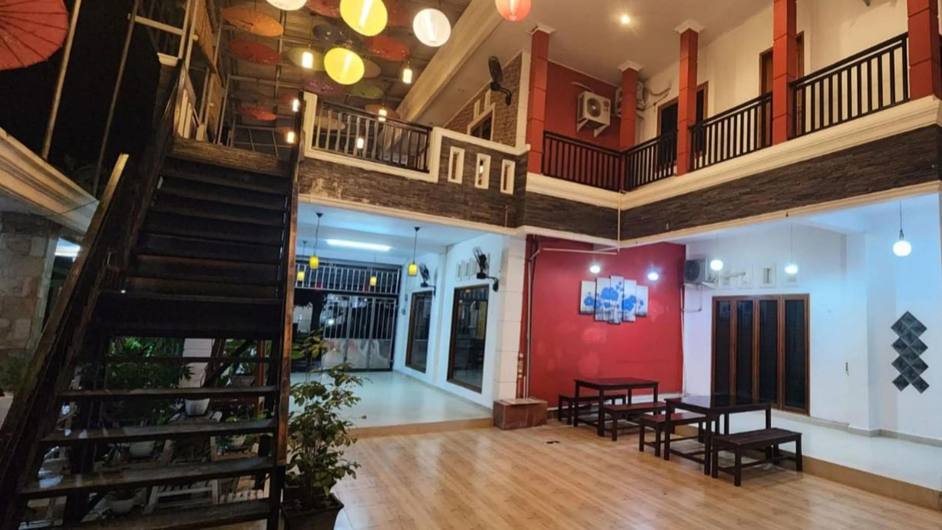 Seating area in Permata Homestay Kotamobagu Mitra RedDoorz