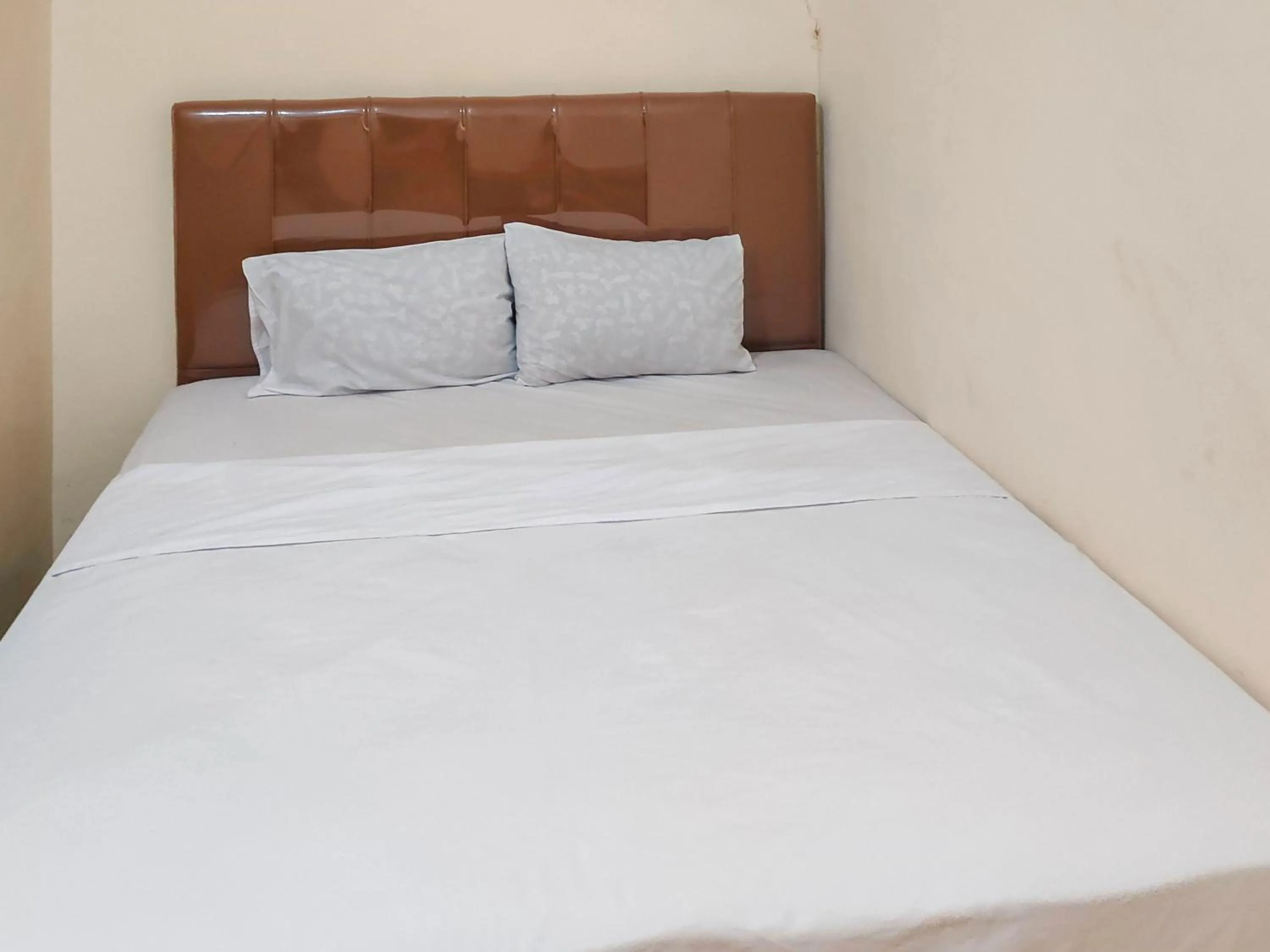 Bedroom, Bed in New Era Family Homestay Binjai Mitra RedDoorz