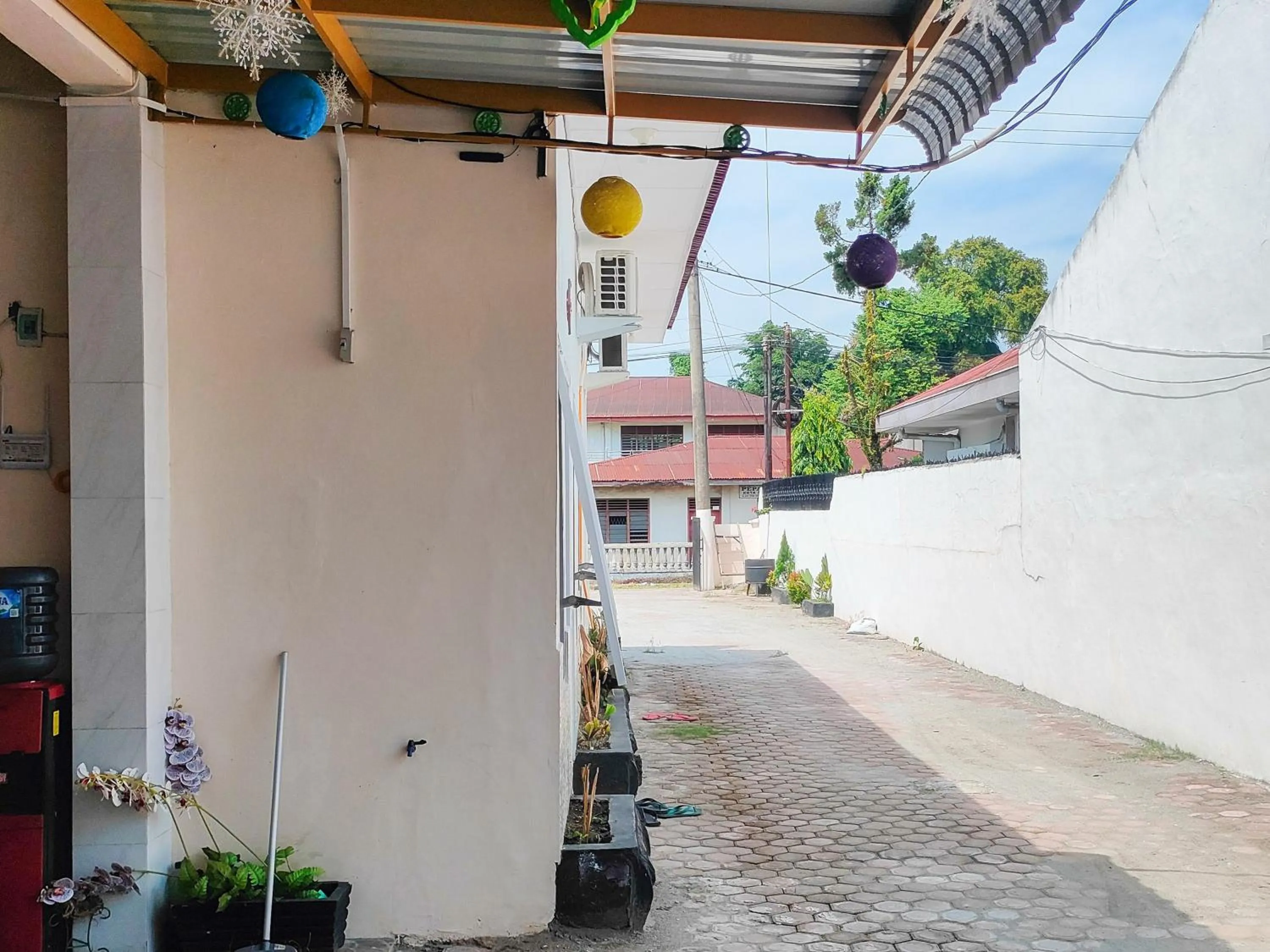 Property building in New Era Family Homestay Binjai Mitra RedDoorz