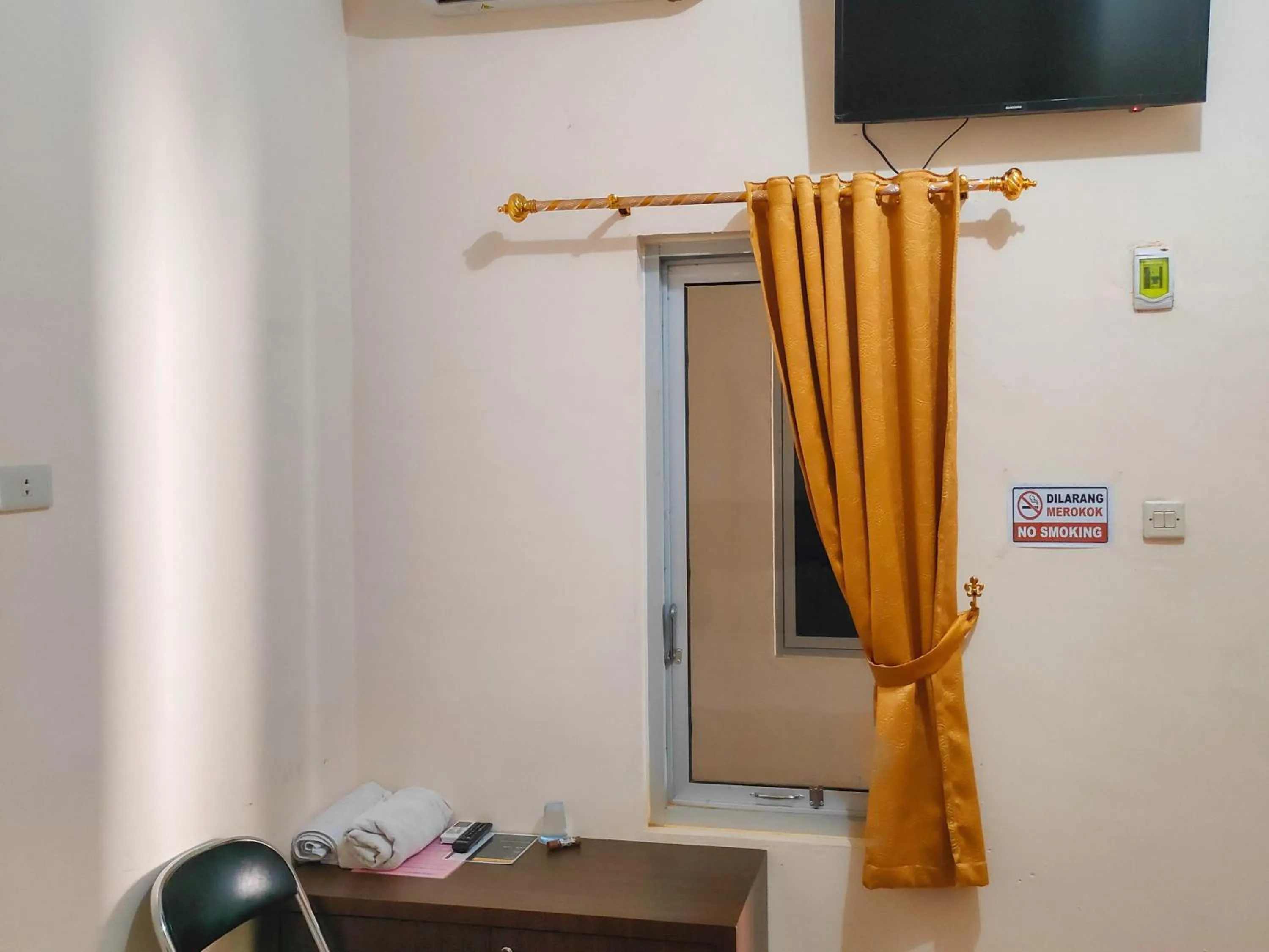 Bedroom in New Era Family Homestay Binjai Mitra RedDoorz