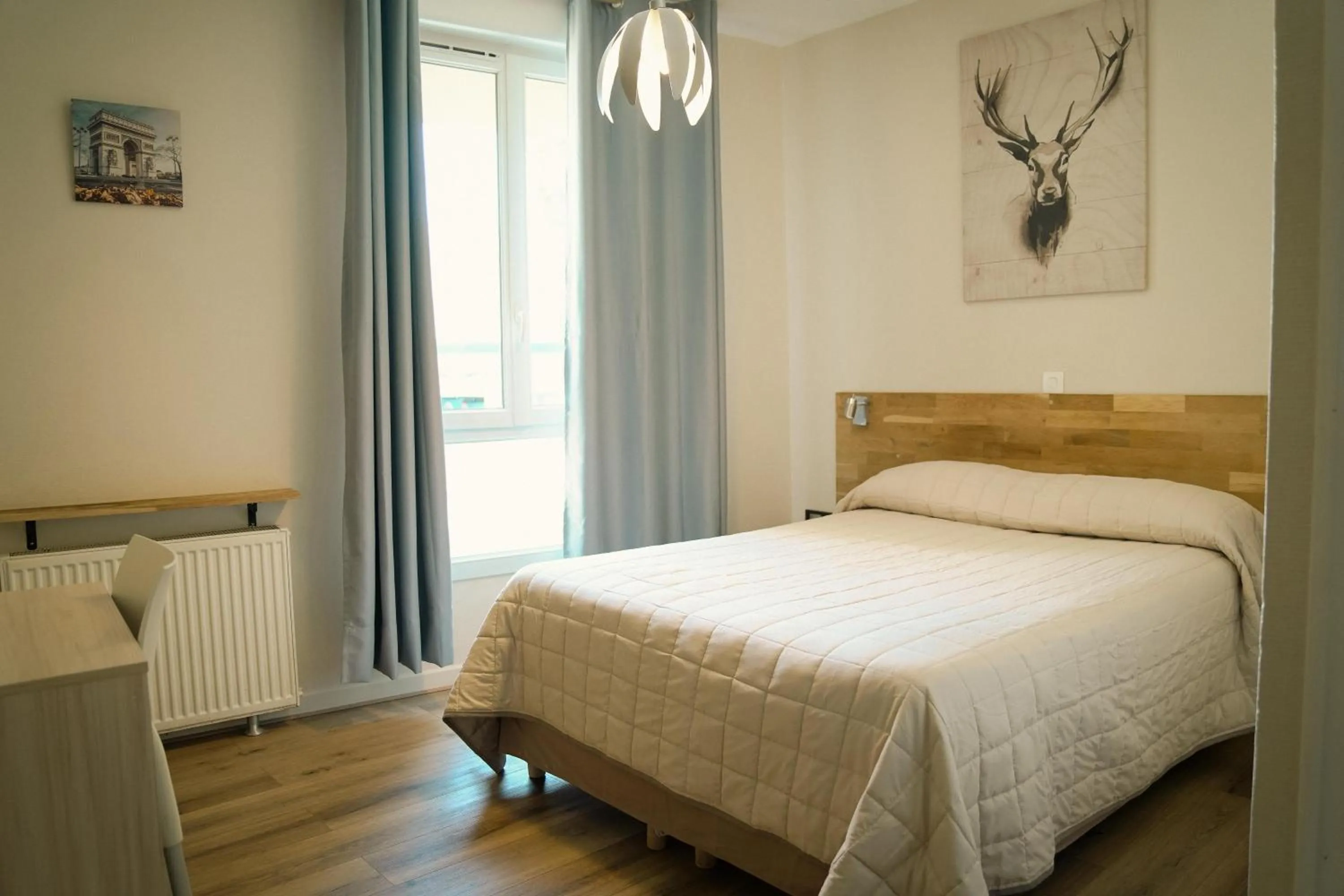 Bed in HOTEL IN PARIS