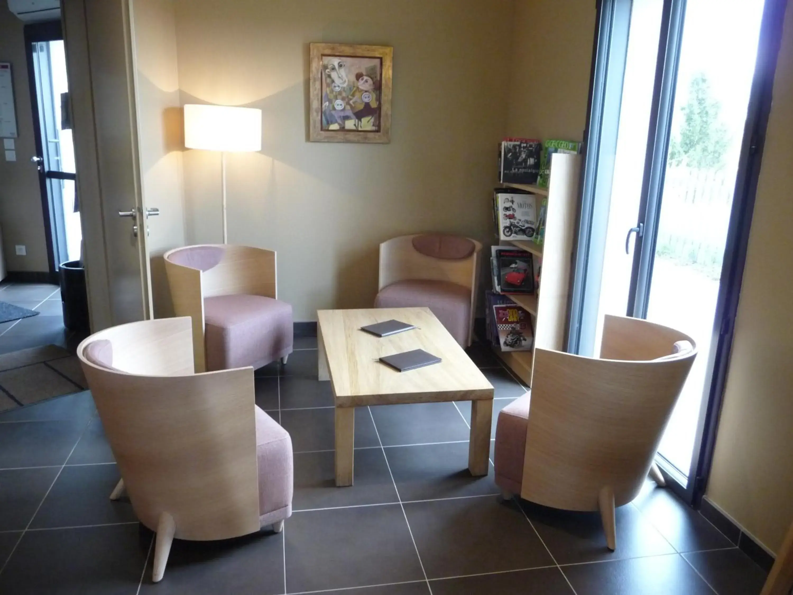 Living room in LOGIS Hôtel-restaurant IMAGO Living room in LOGIS Hôtel-restaurant IMAGO