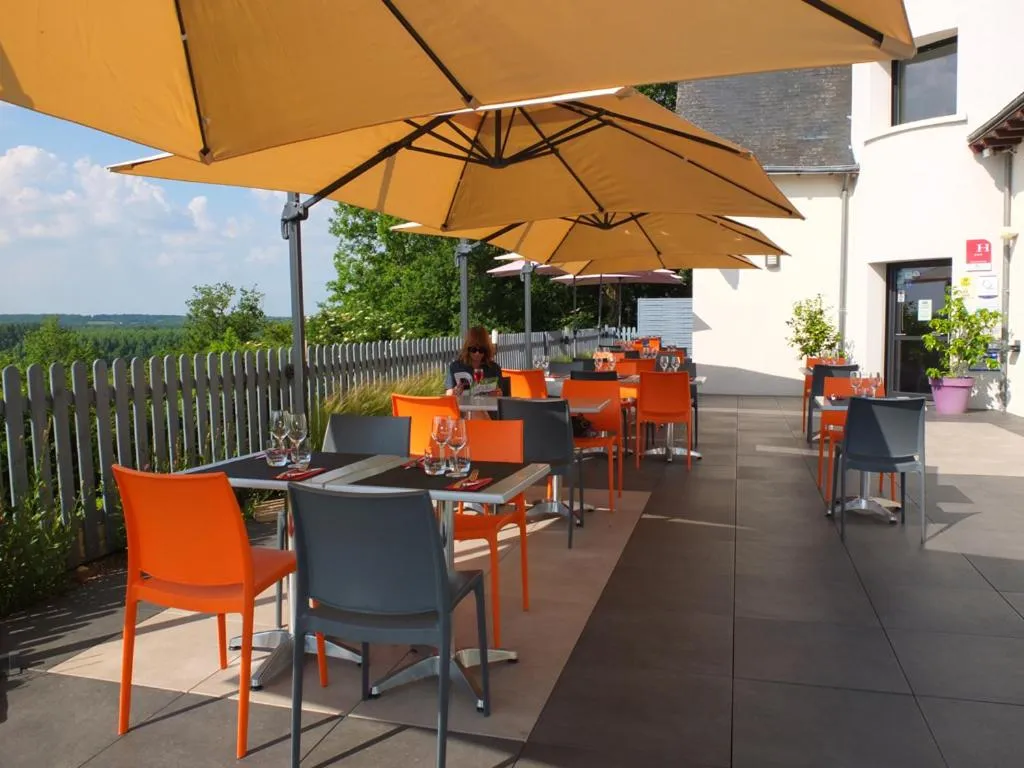 Balcony/Terrace in LOGIS Hôtel-restaurant IMAGO