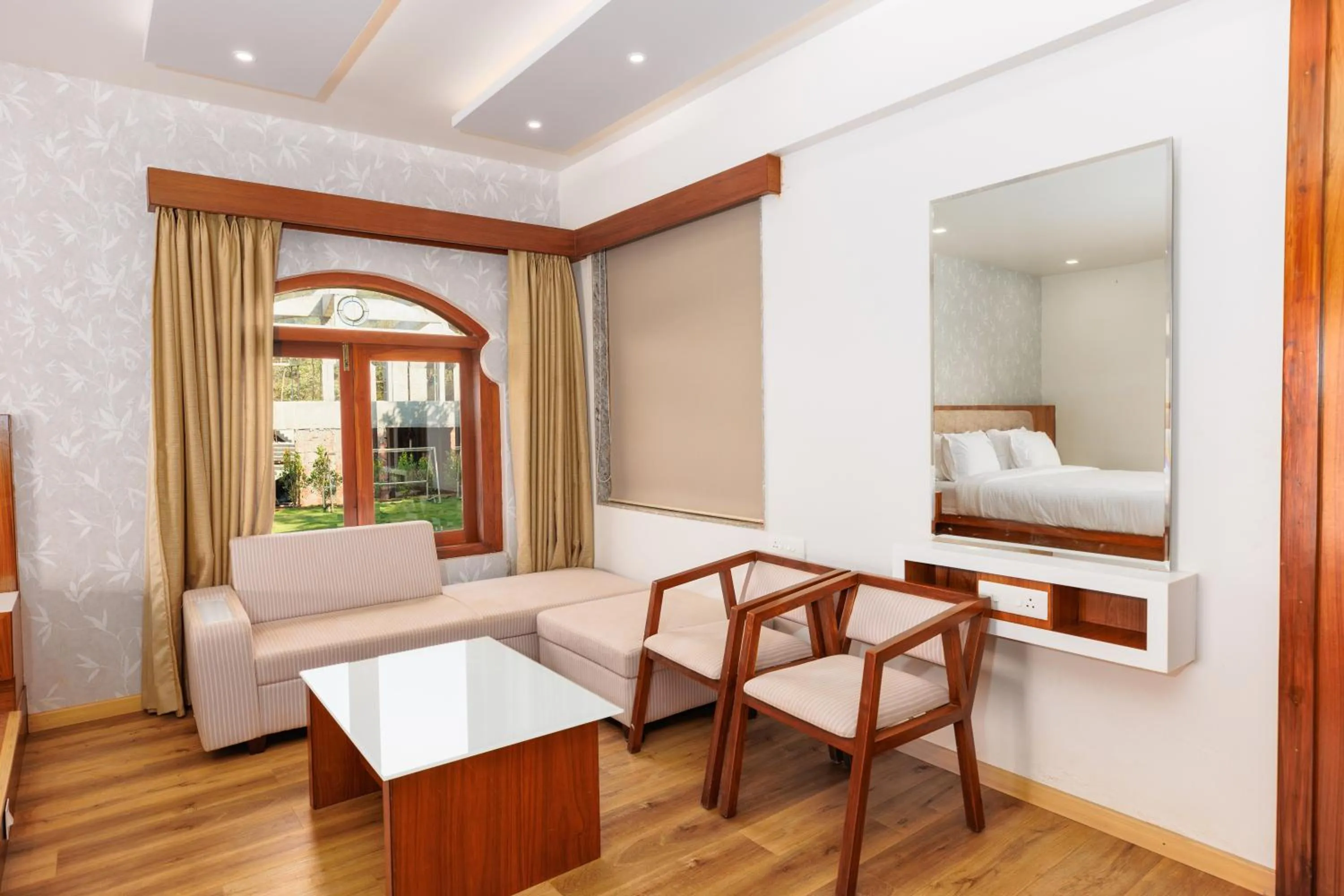 Seating area, Bed in Urmilaa Green County Resort 35 KM From Kolhapur