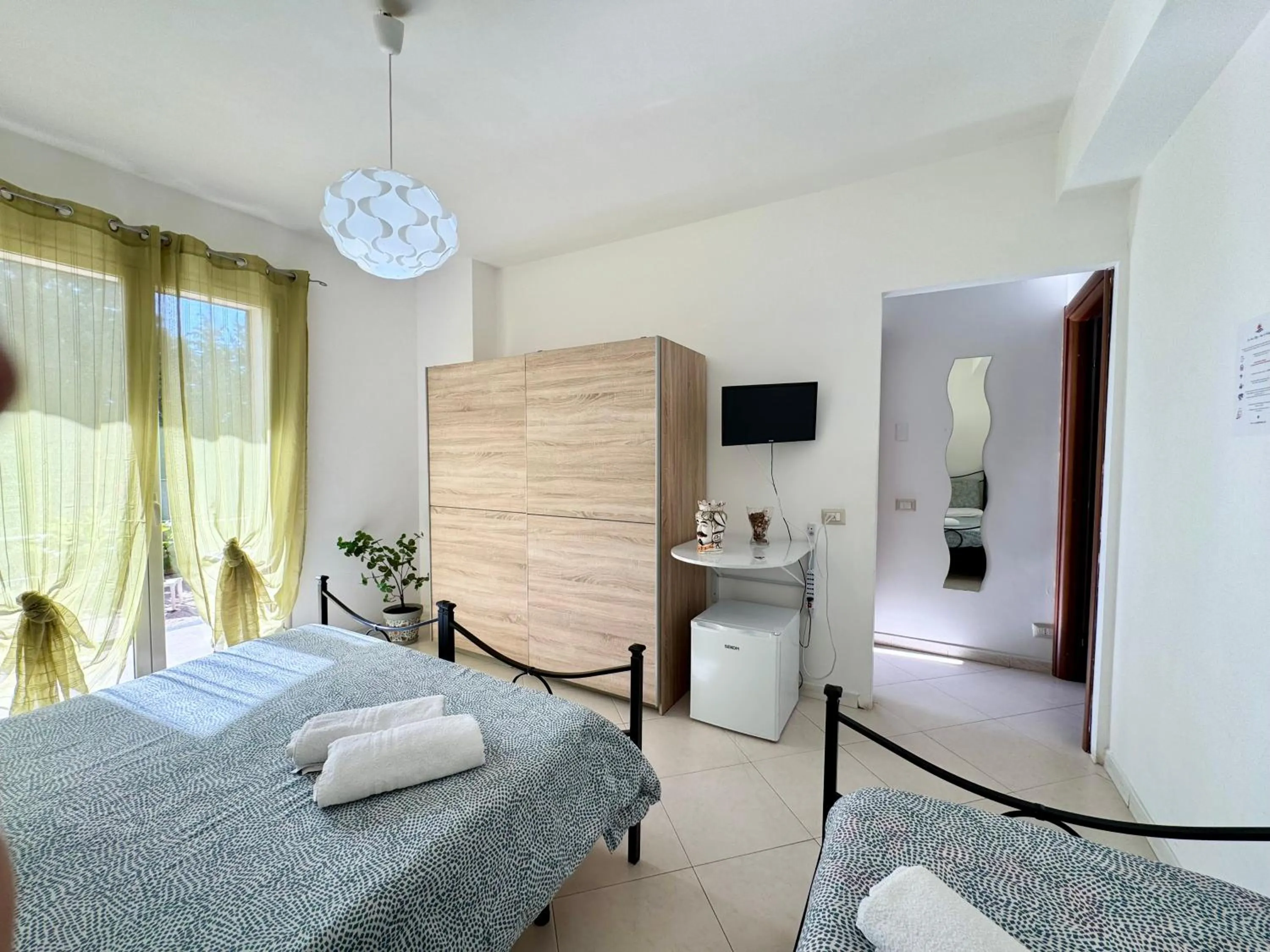 Photo of the whole room, Bed in New Naxos Village