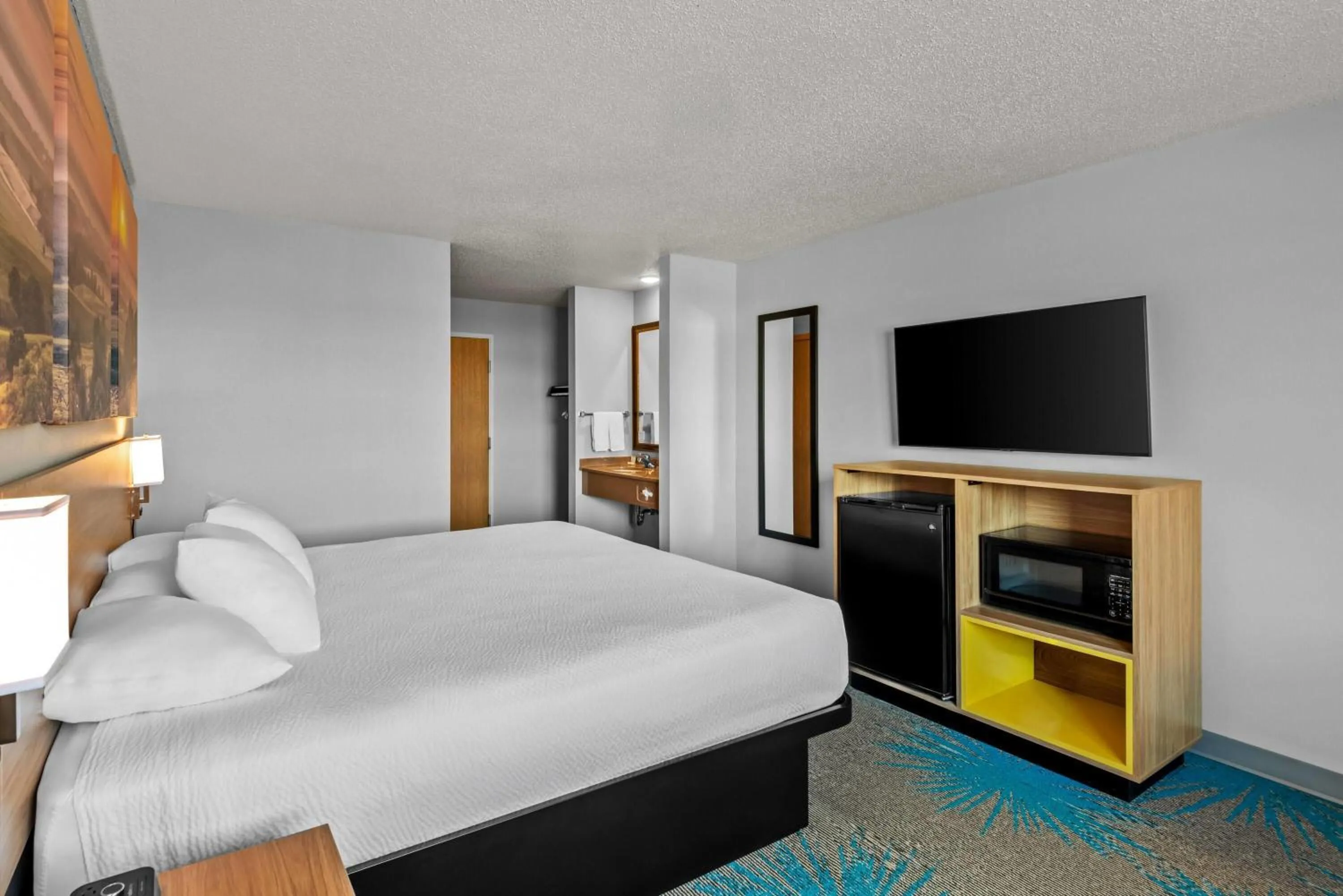 Bed in Days Inn by Wyndham Carroll