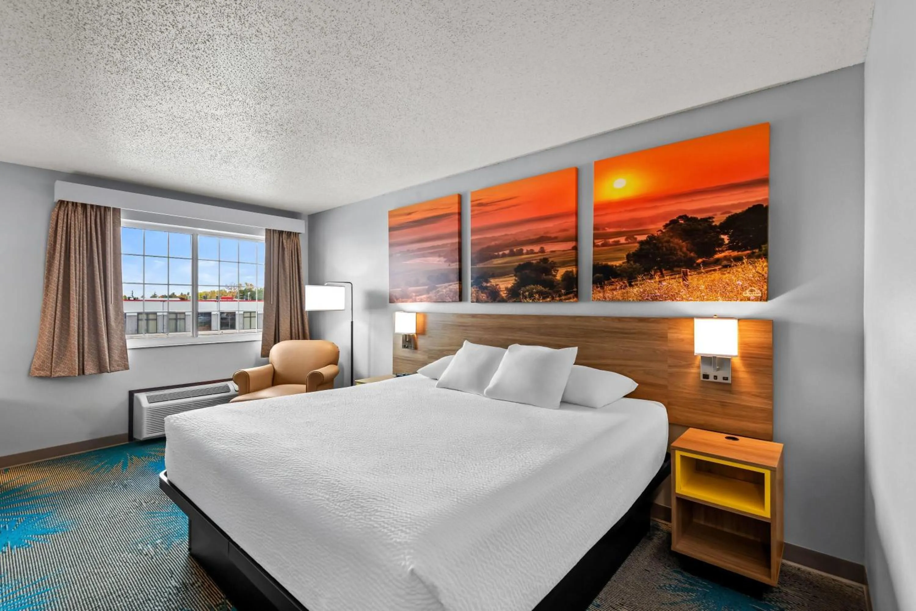 Bed in Days Inn by Wyndham Carroll