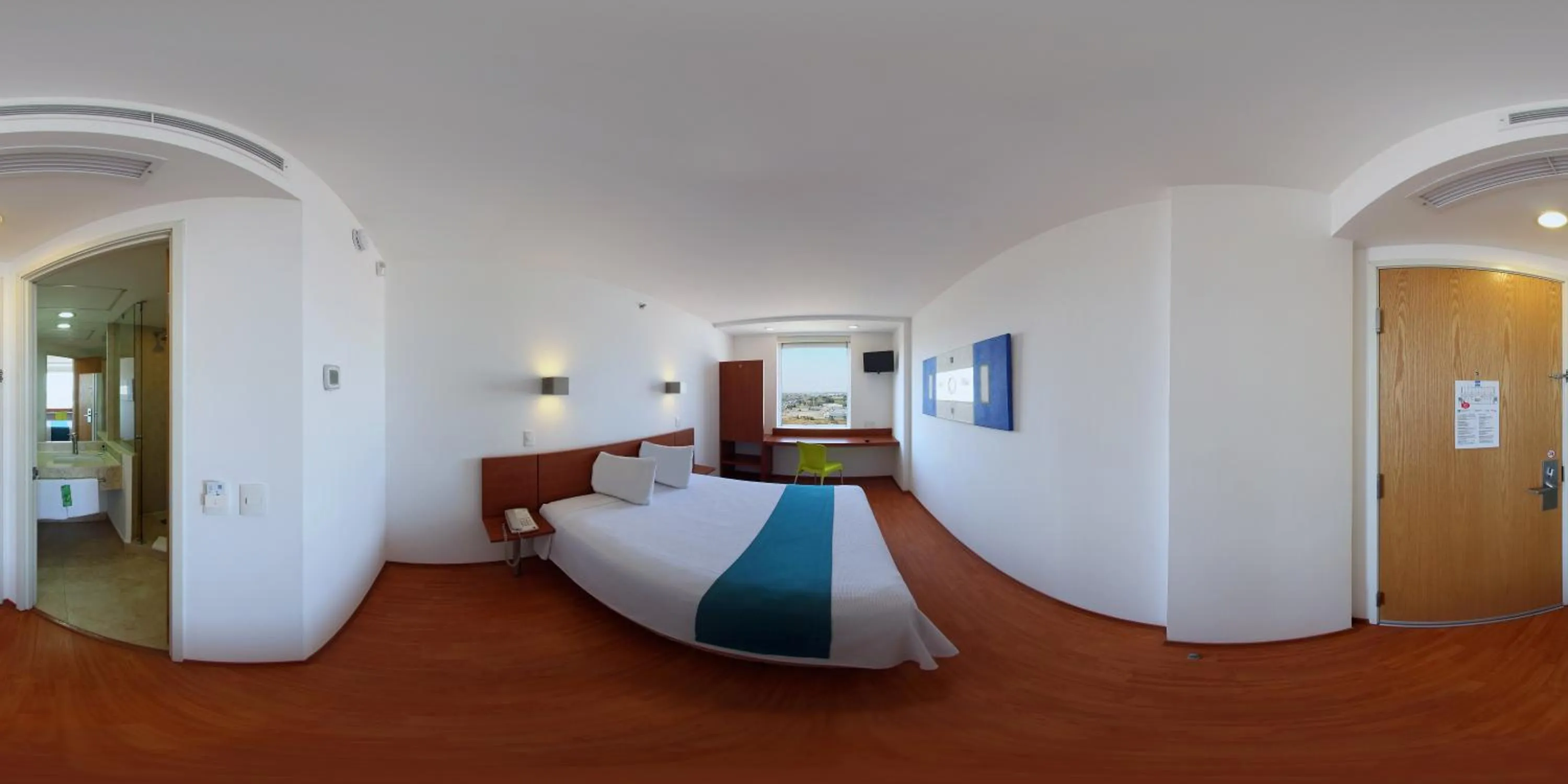 Photo of the whole room, Bed in One Queretaro Aeropuerto