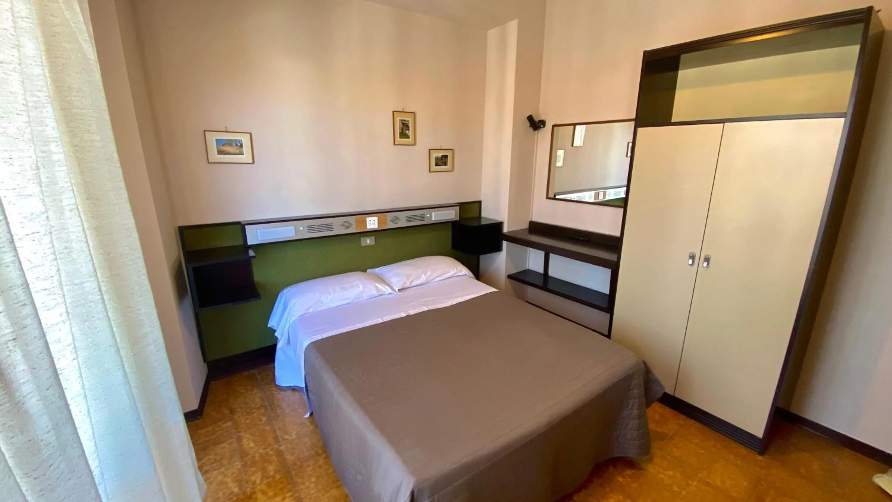 Bed in Umbria Green Central Rooms