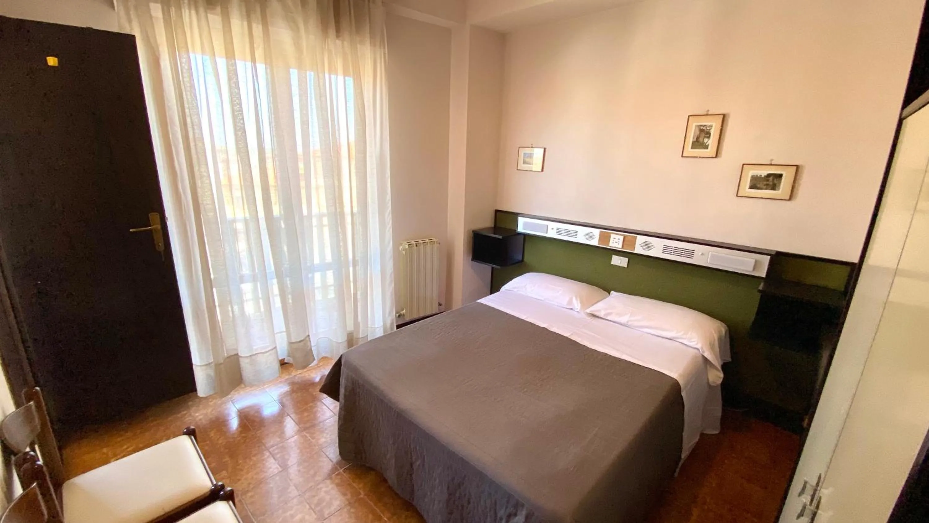 Bed in Umbria Green Central Rooms