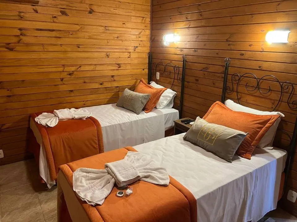 Bed in Hotel Cabanas Glamour