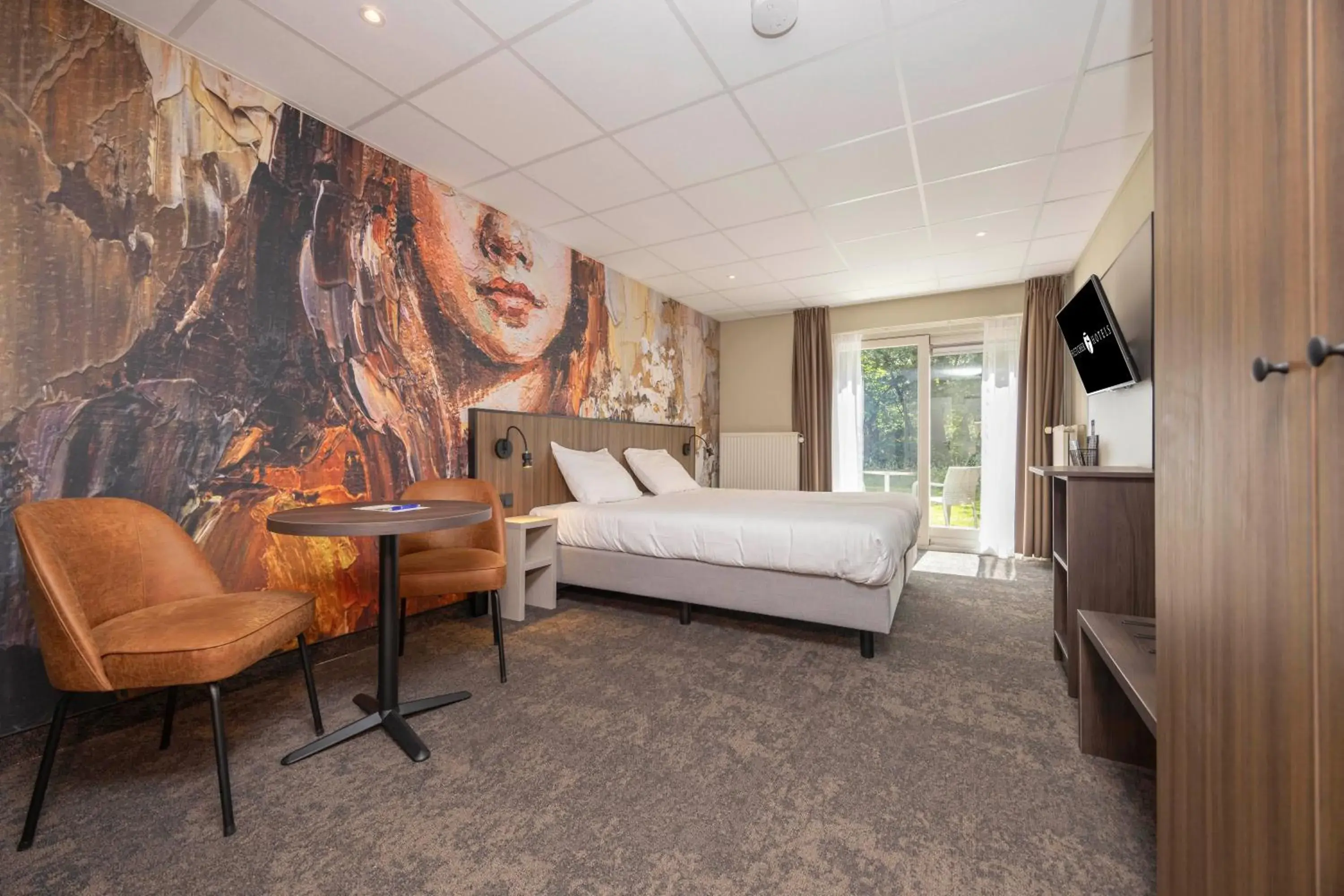 Bedroom, Bed in Fletcher Hotel Restaurant Victoria-Hoenderloo Bedroom, Bed in Fletcher Hotel Restaurant Victoria-Hoenderloo