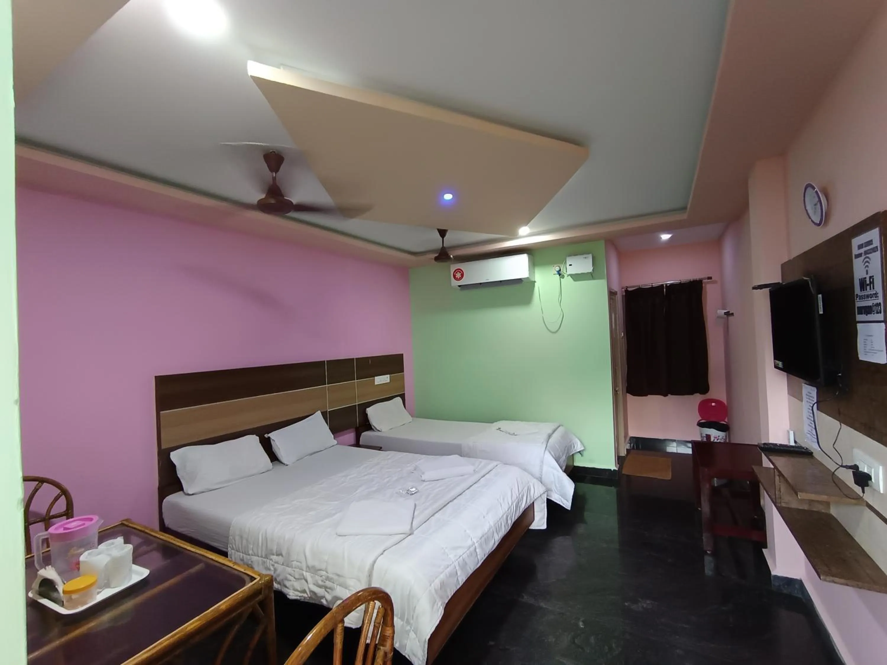 Bed in Sri Murugan Beach Paradise Hotel
