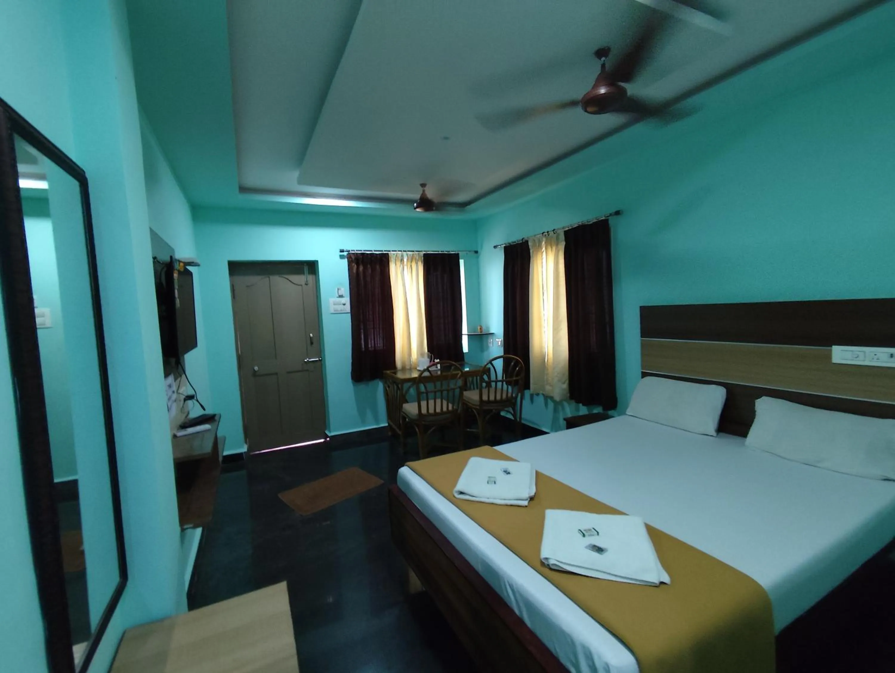 Bedroom, Bed in Sri Murugan Beach Paradise Hotel