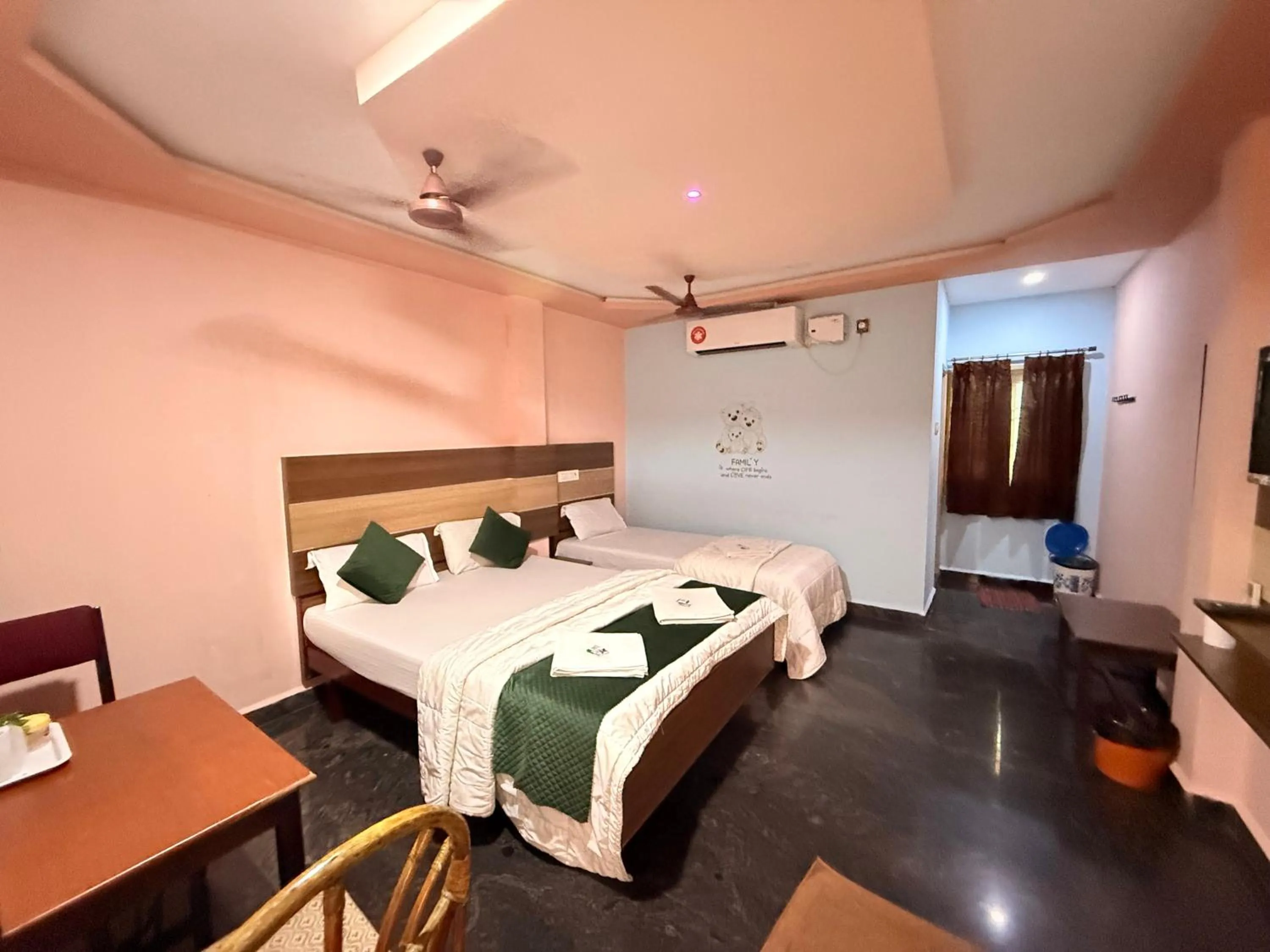 Bed in Sri Murugan Beach Paradise Hotel