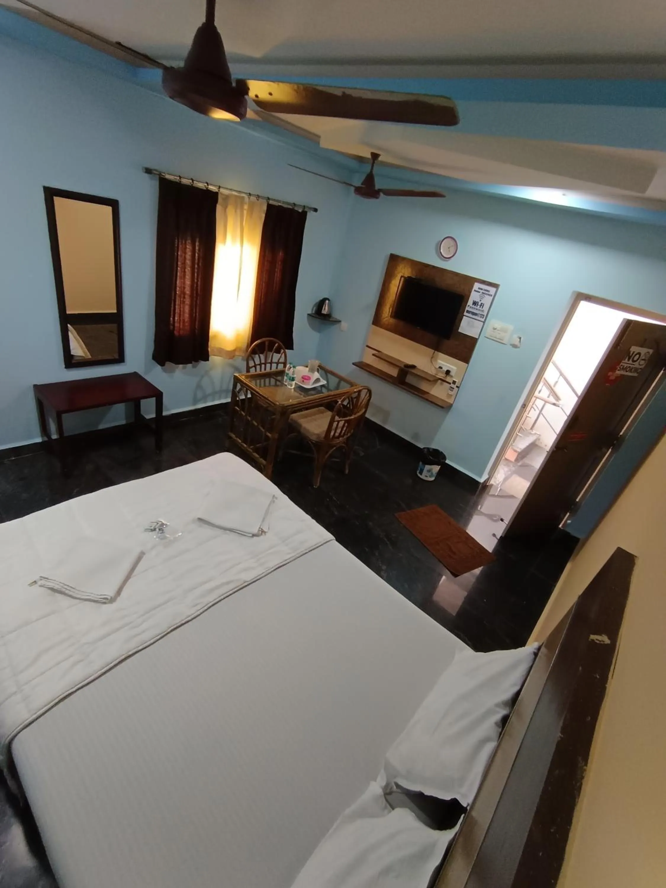 Bed in Sri Murugan Beach Paradise Hotel