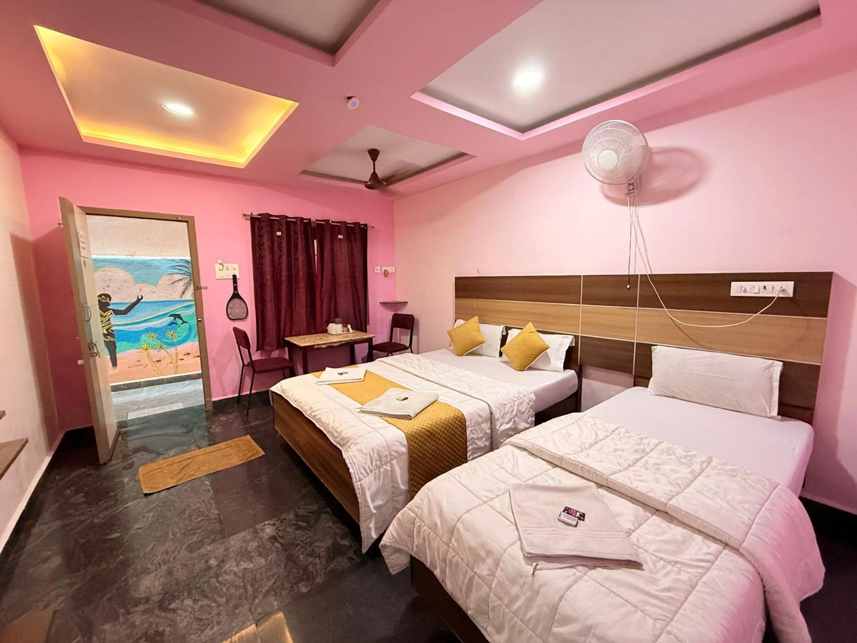 Bed in Sri Murugan Beach Paradise Hotel