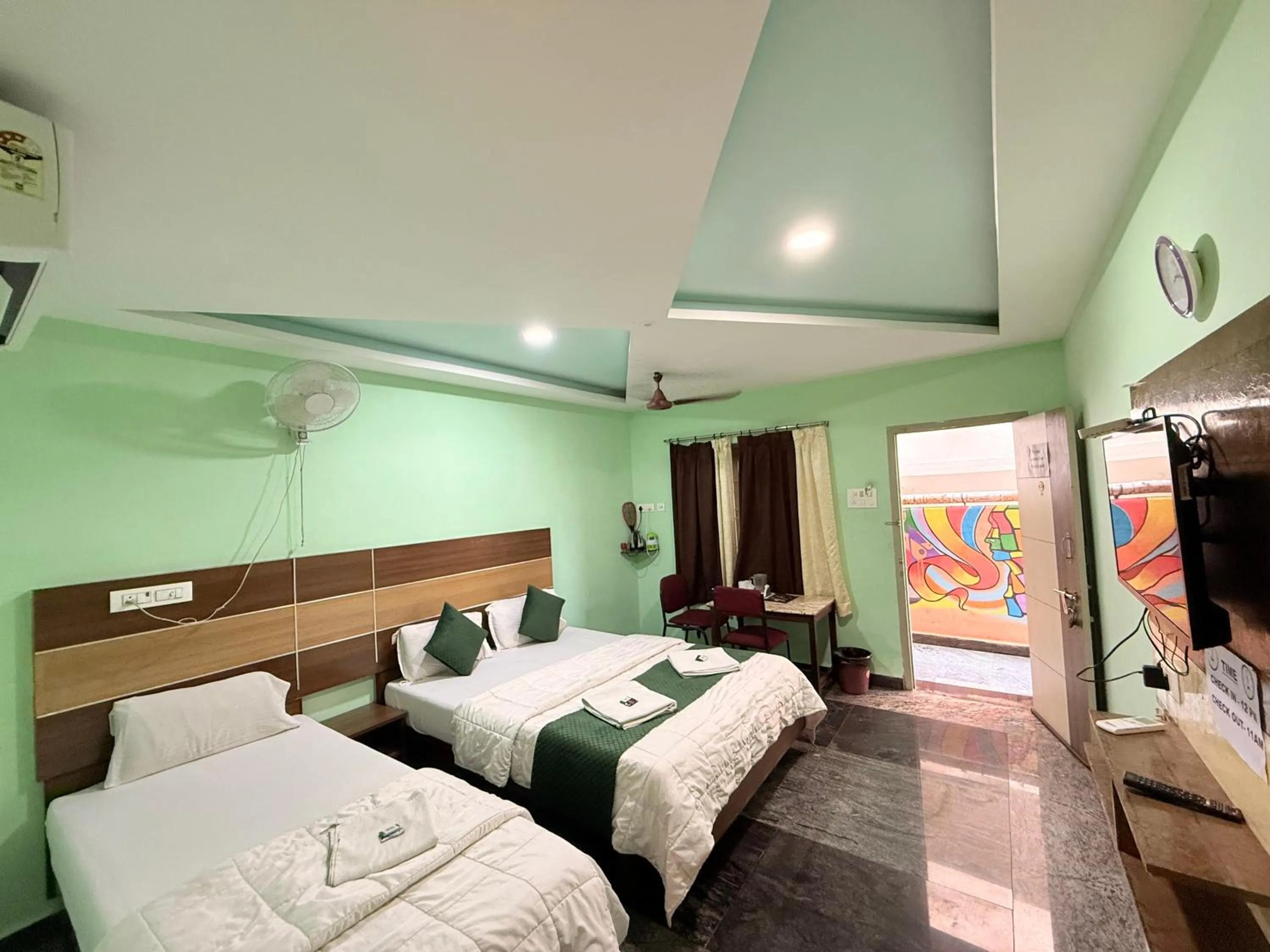 Bed in Sri Murugan Beach Paradise Hotel
