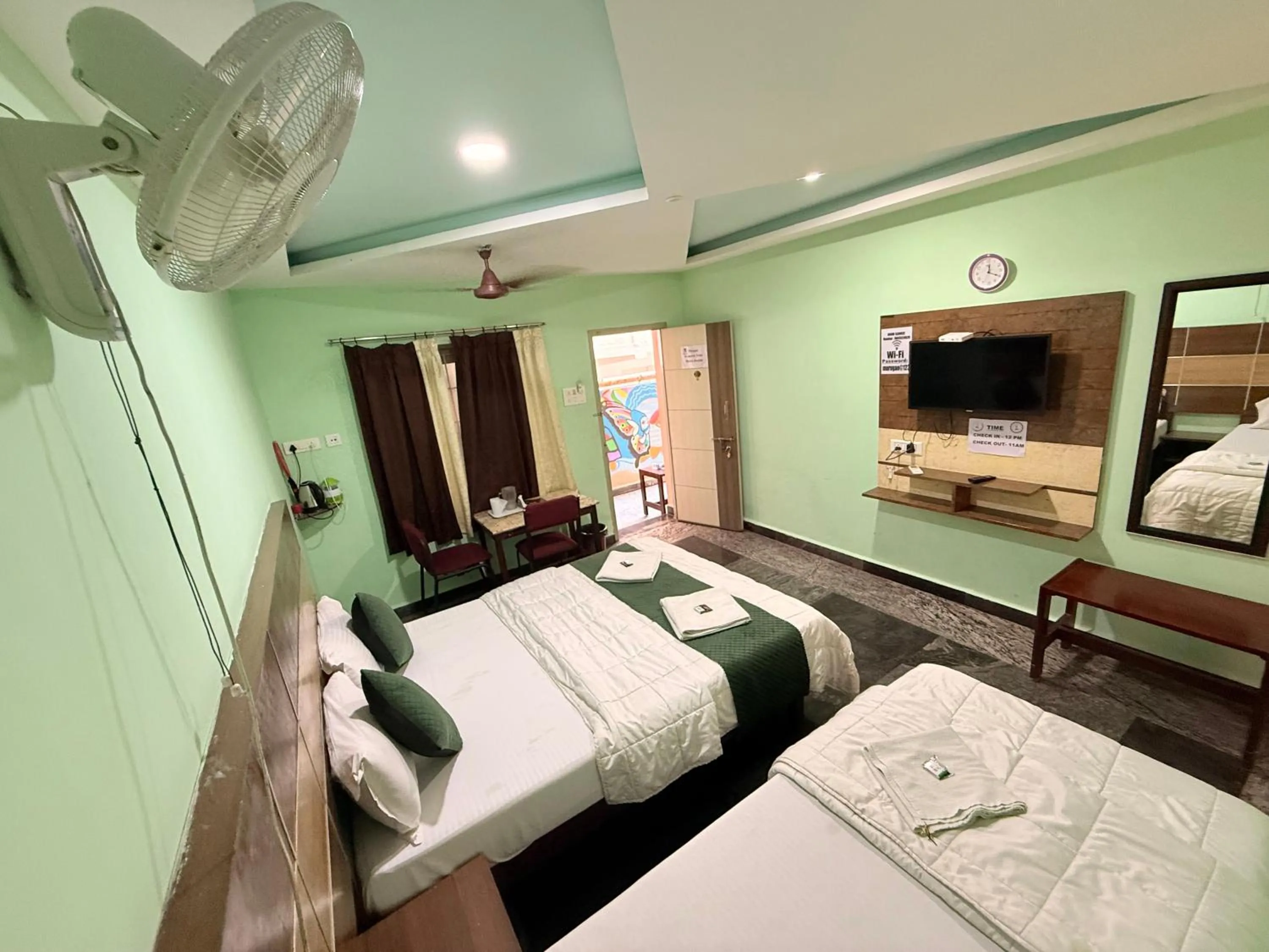 Bed in Sri Murugan Beach Paradise Hotel