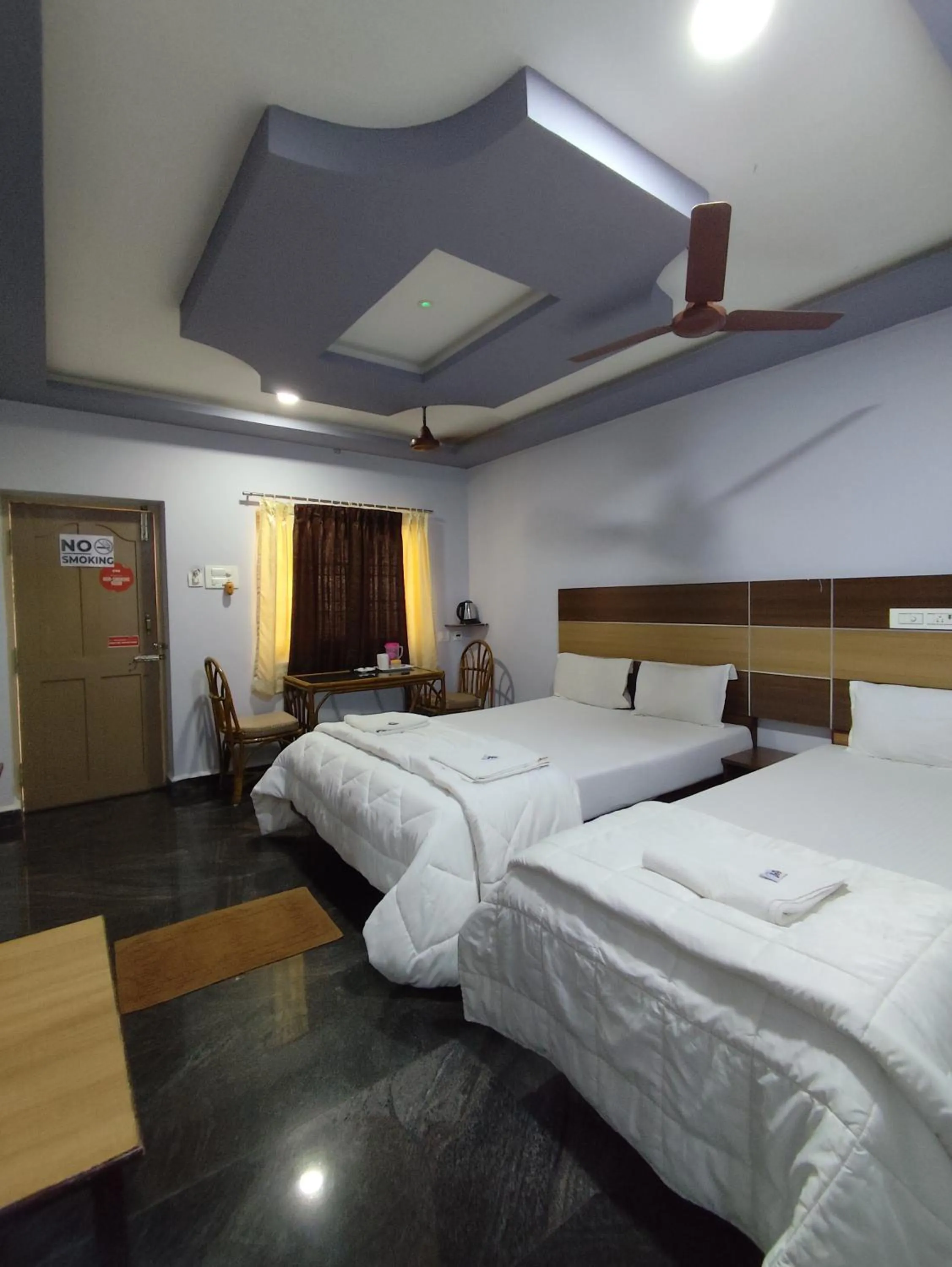 Bed in Sri Murugan Beach Paradise Hotel