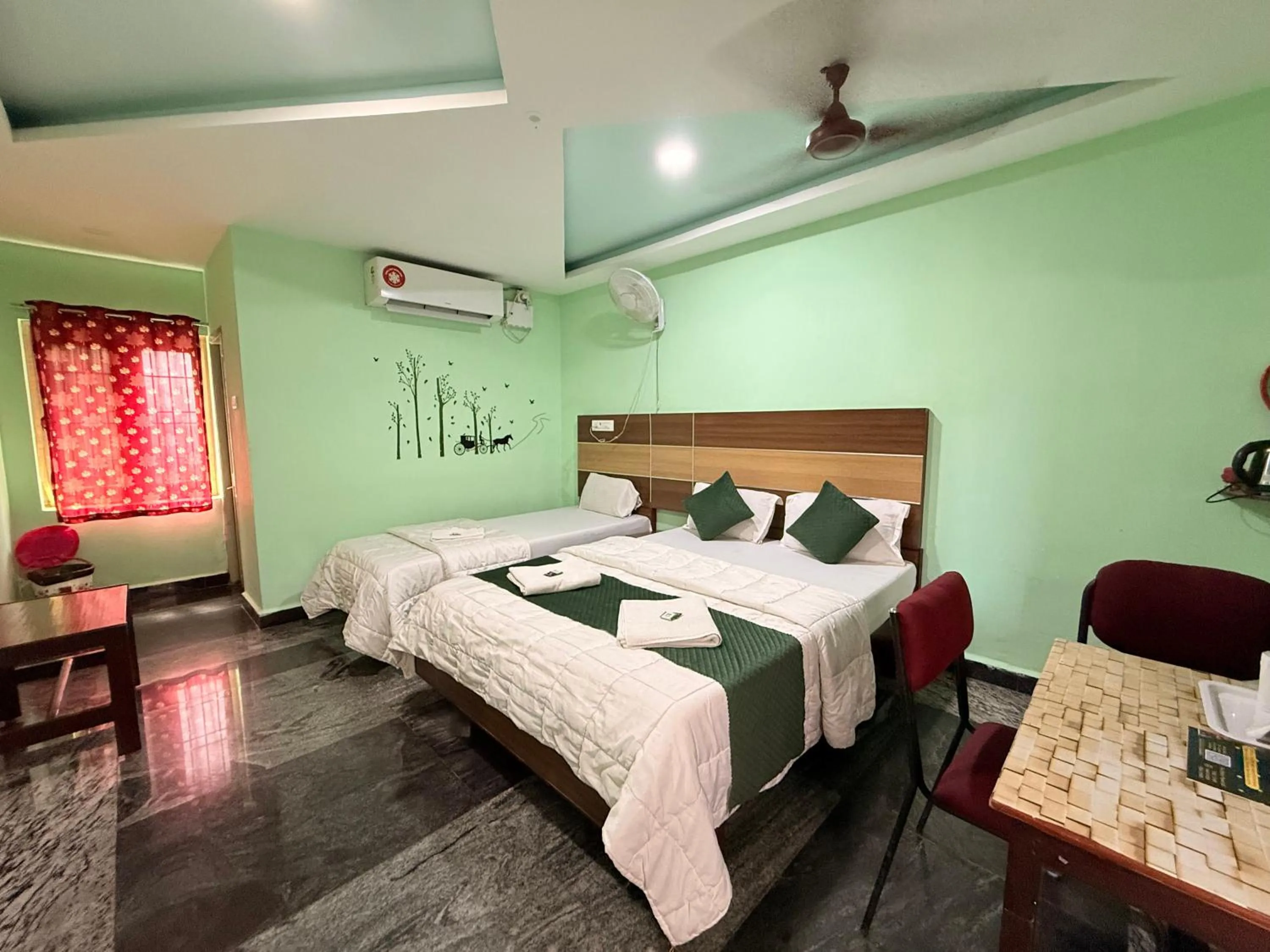 Bed in Sri Murugan Beach Paradise Hotel