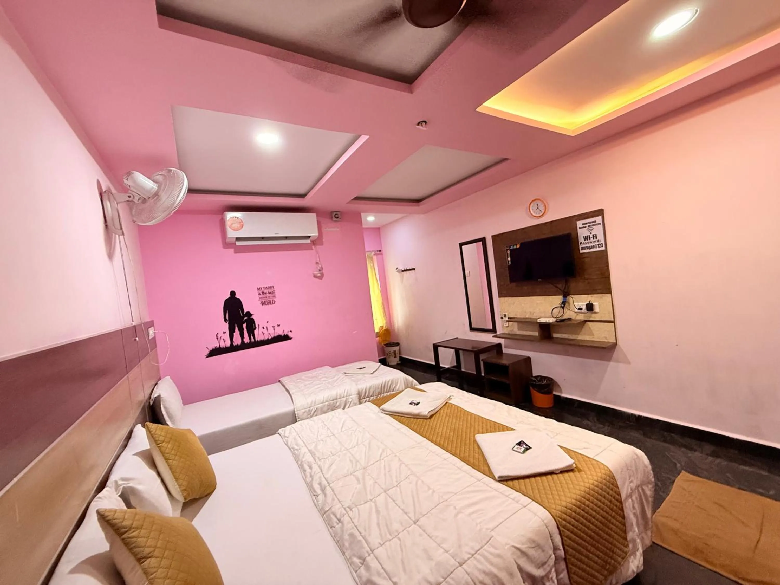 Bed in Sri Murugan Beach Paradise Hotel