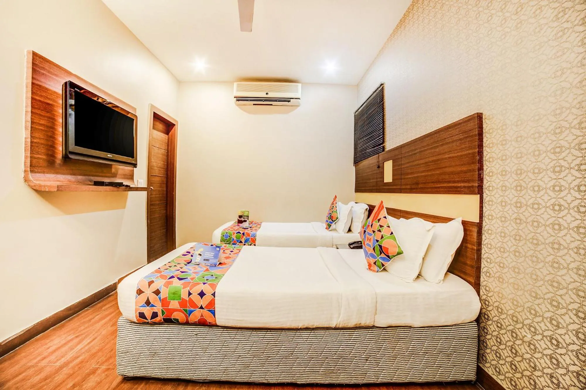 Bed in FabHotel Aqua