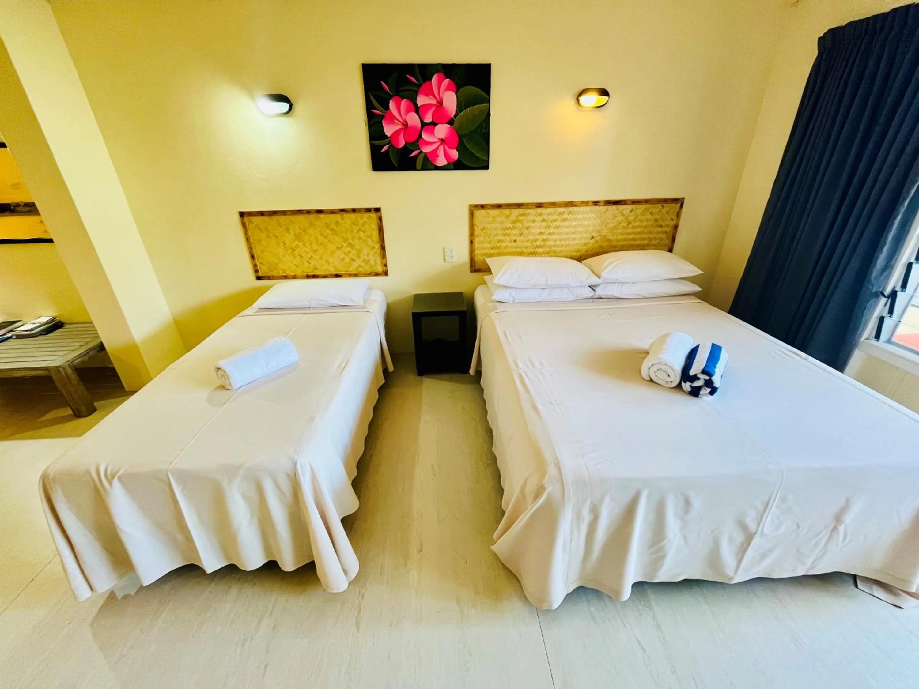 Bed in Kiikii Inn & Suites