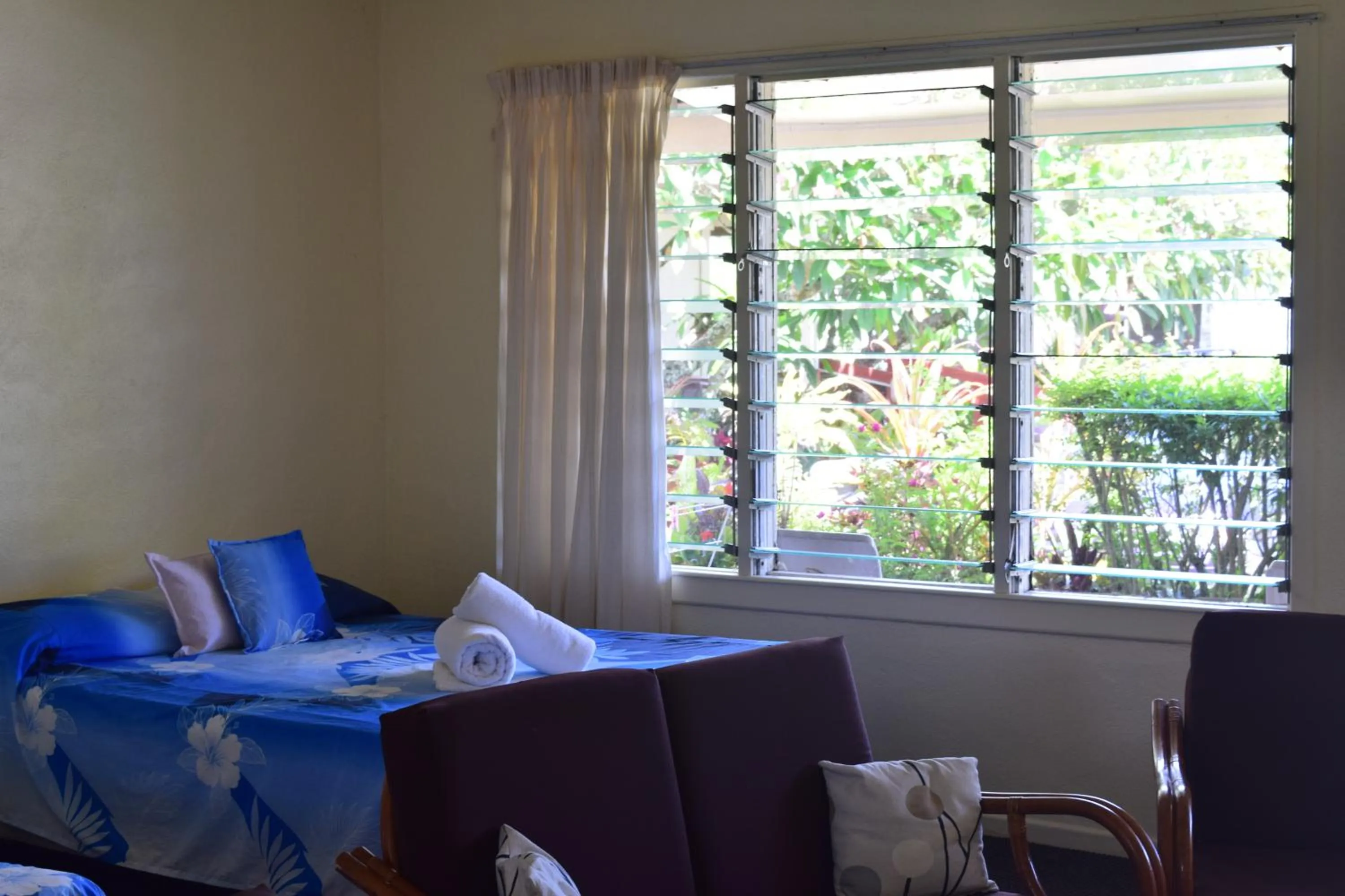 Bed in Kiikii Inn & Suites