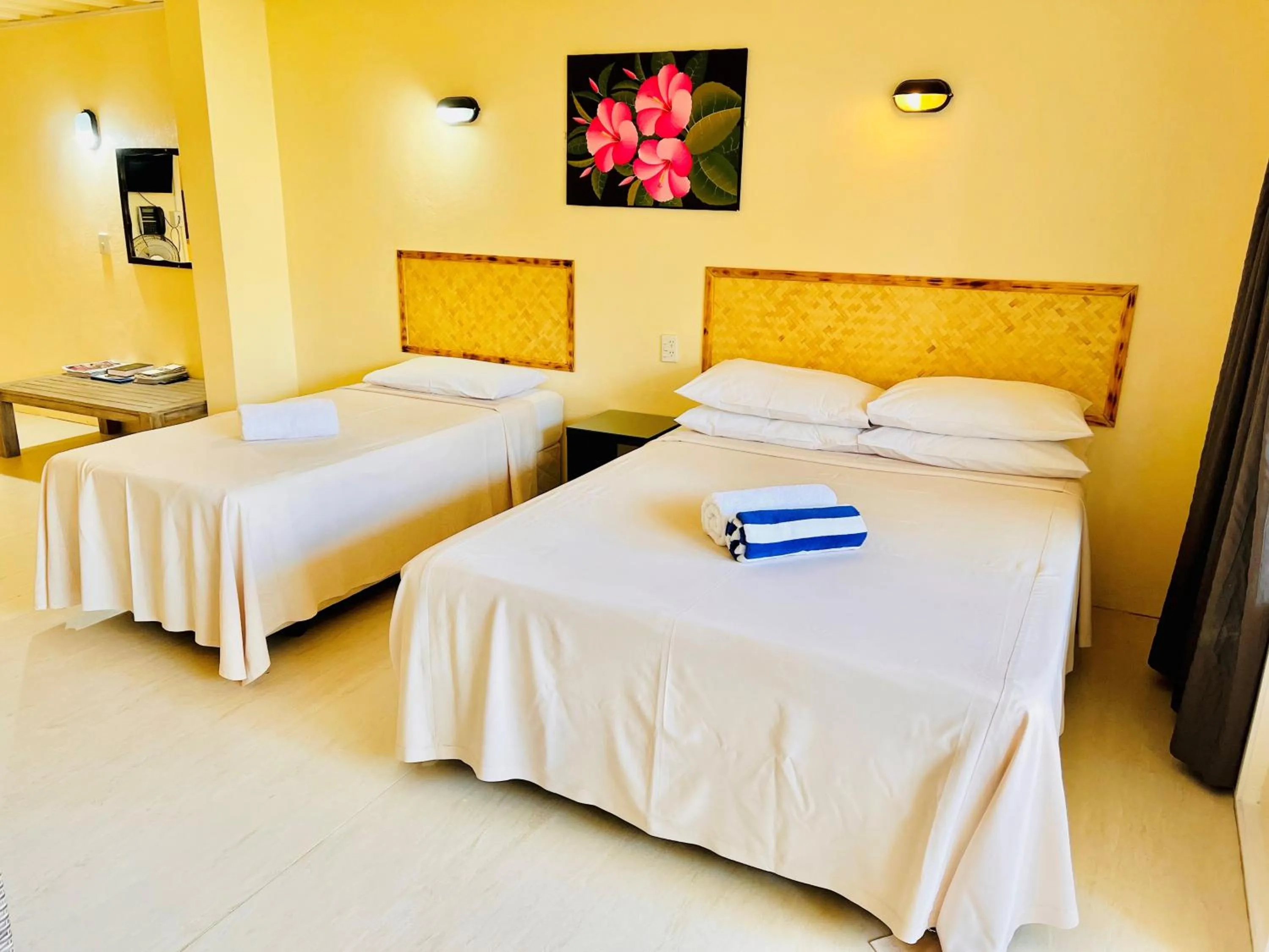 Bed in Kiikii Inn & Suites