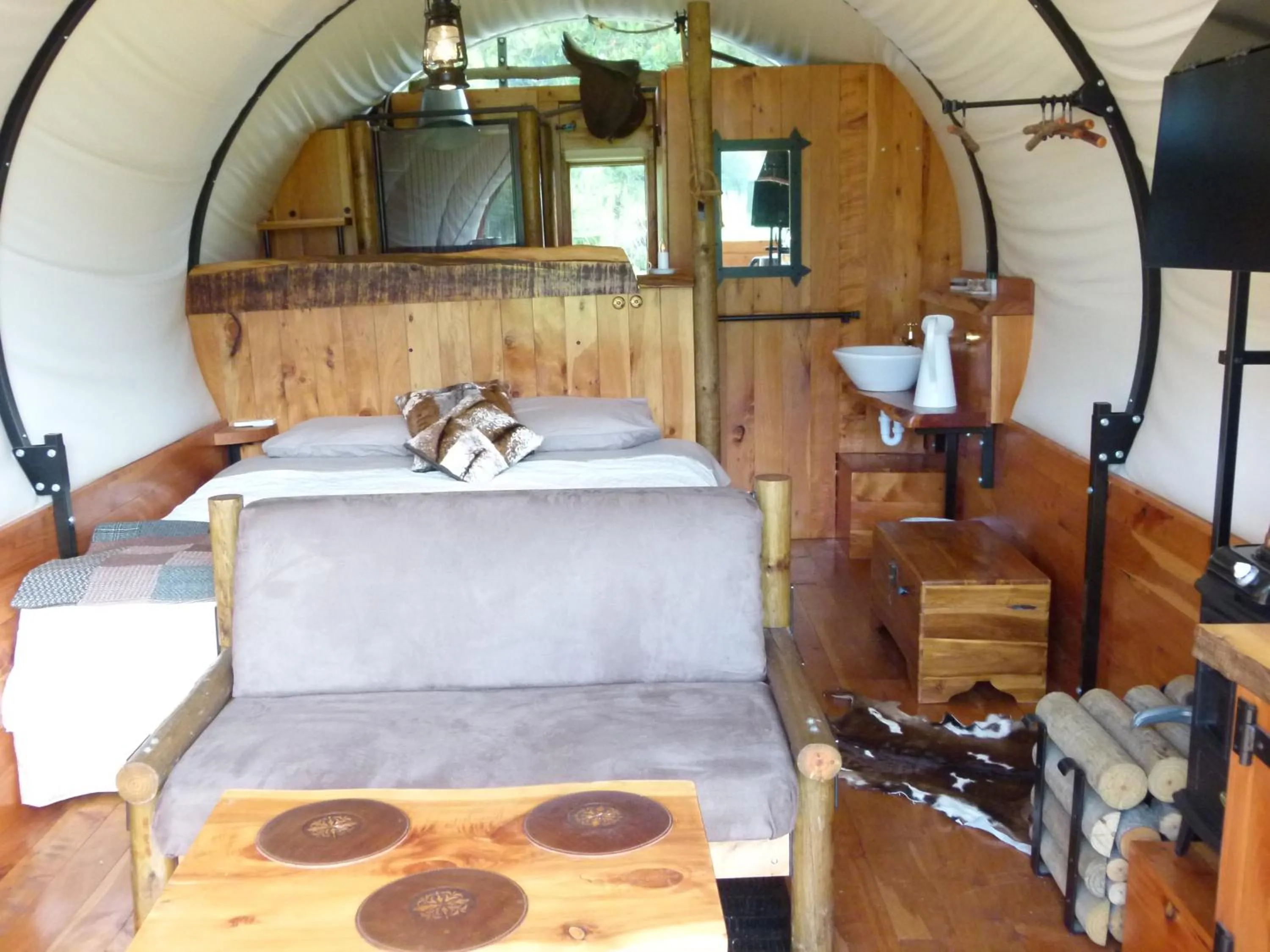 Bed in Wacky Stays - unique farm-stay glamping rentals, FREE animal feeding tours