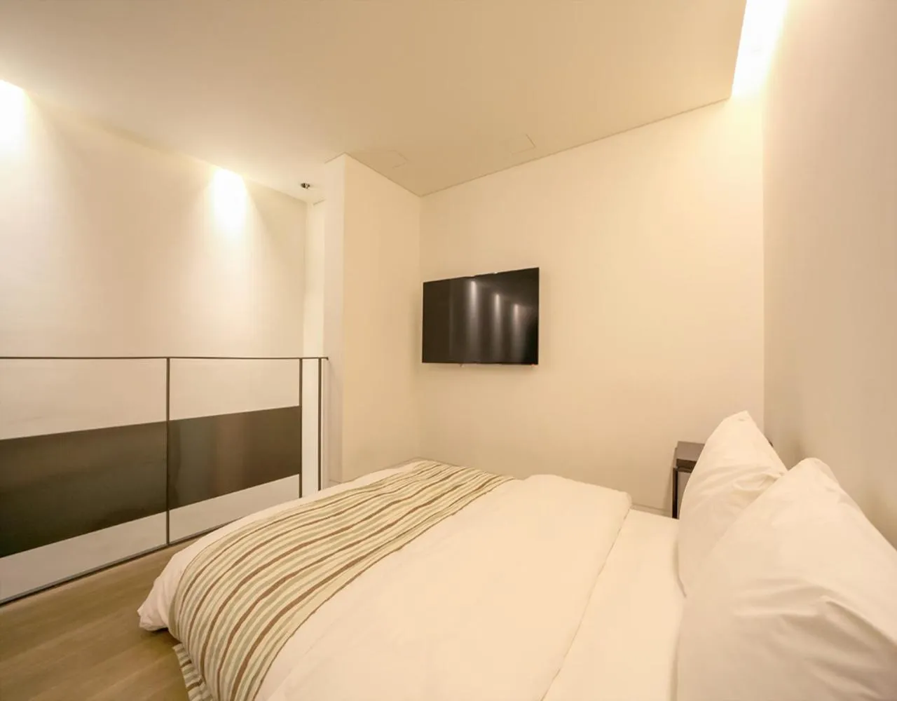 Bed in JS Boutique Hotel