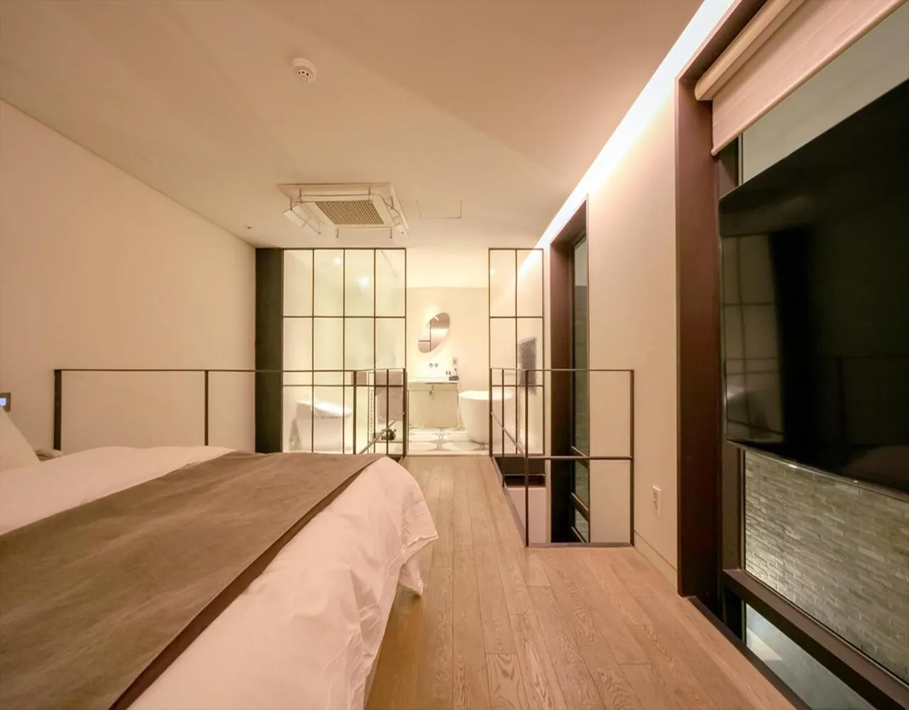 Bed in JS Boutique Hotel