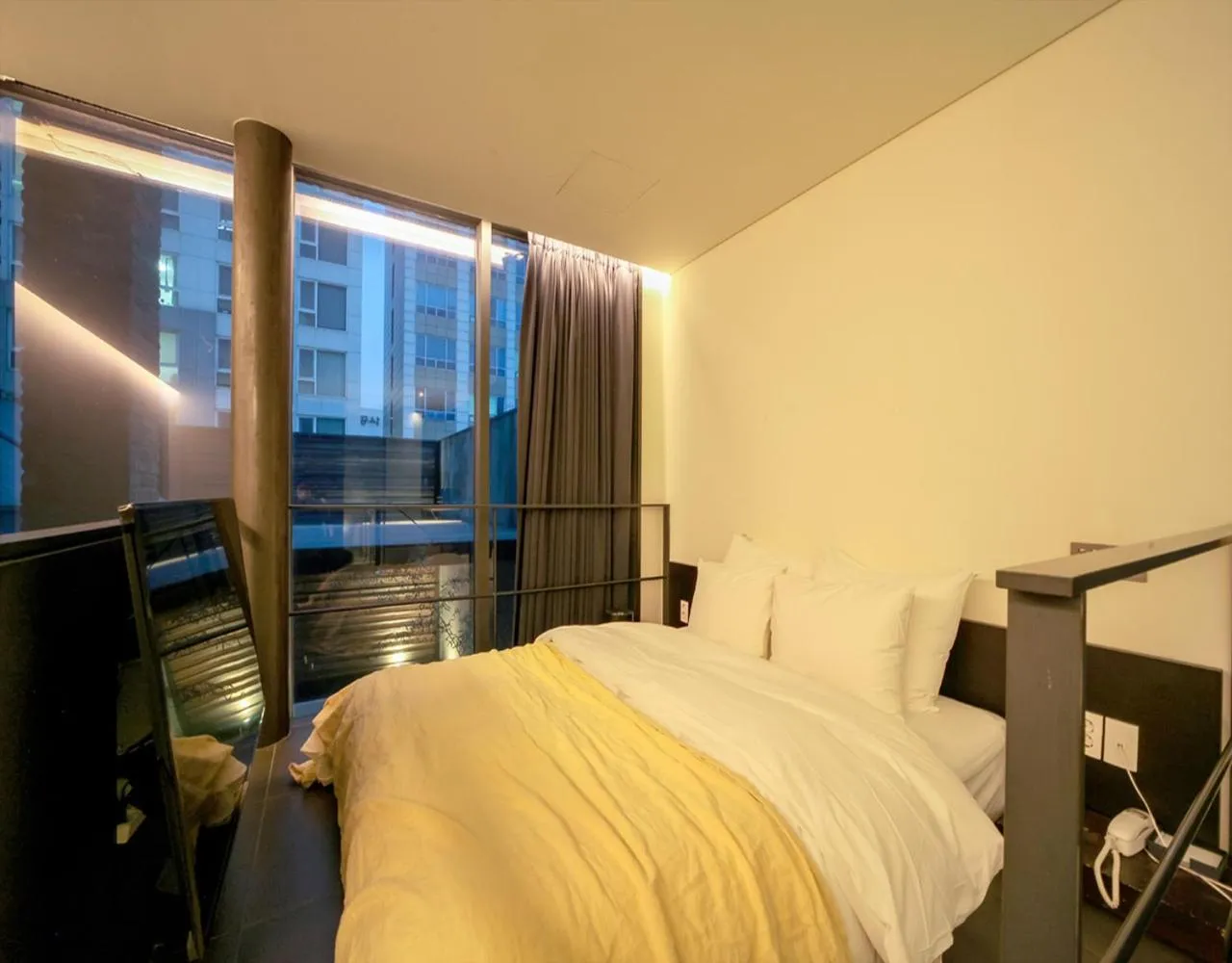 Bed in JS Boutique Hotel