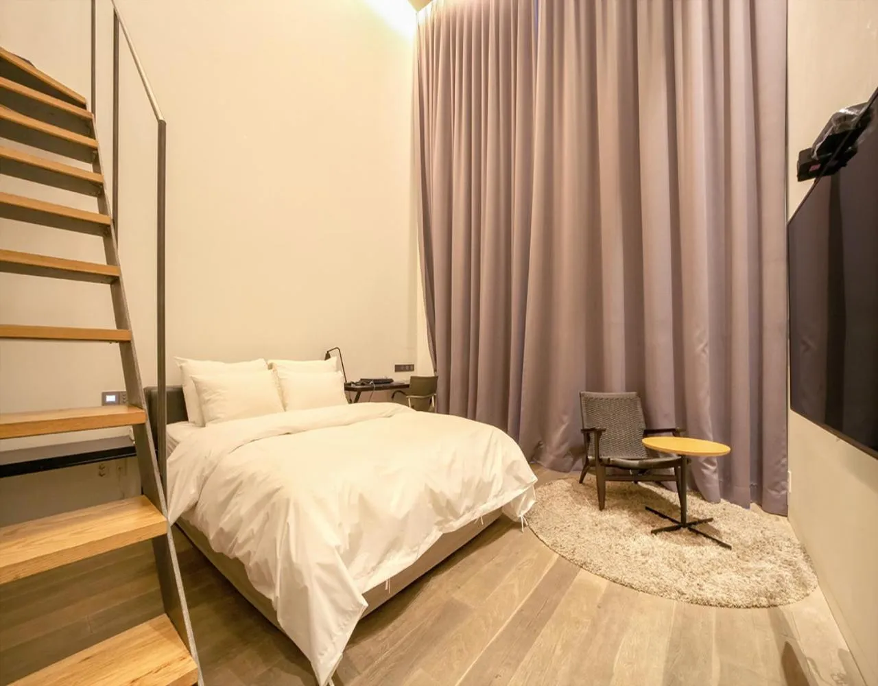 Bed in JS Boutique Hotel