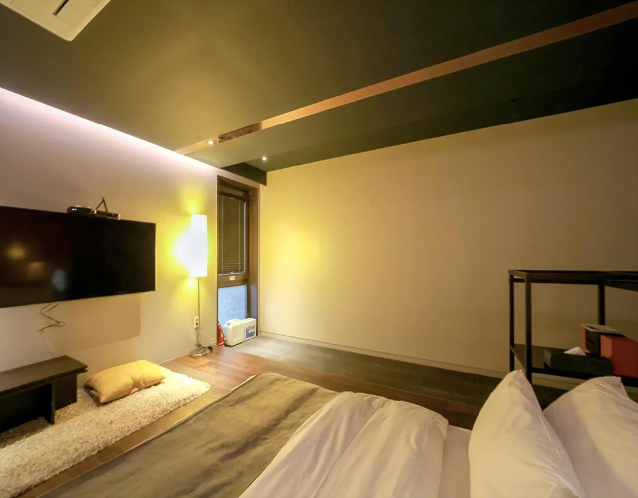 Bed in JS Boutique Hotel