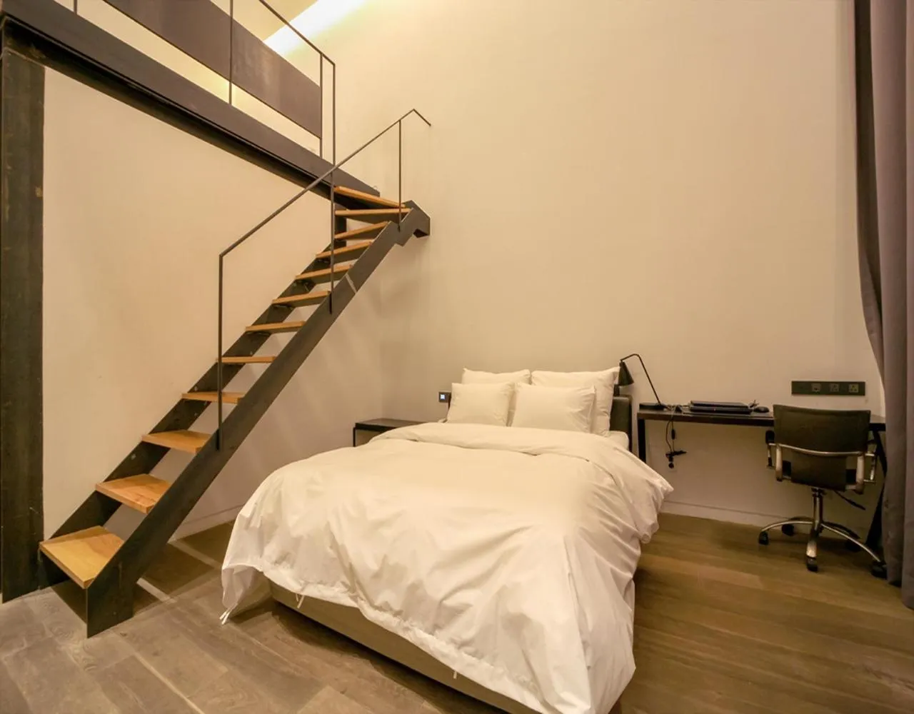 Bed in JS Boutique Hotel