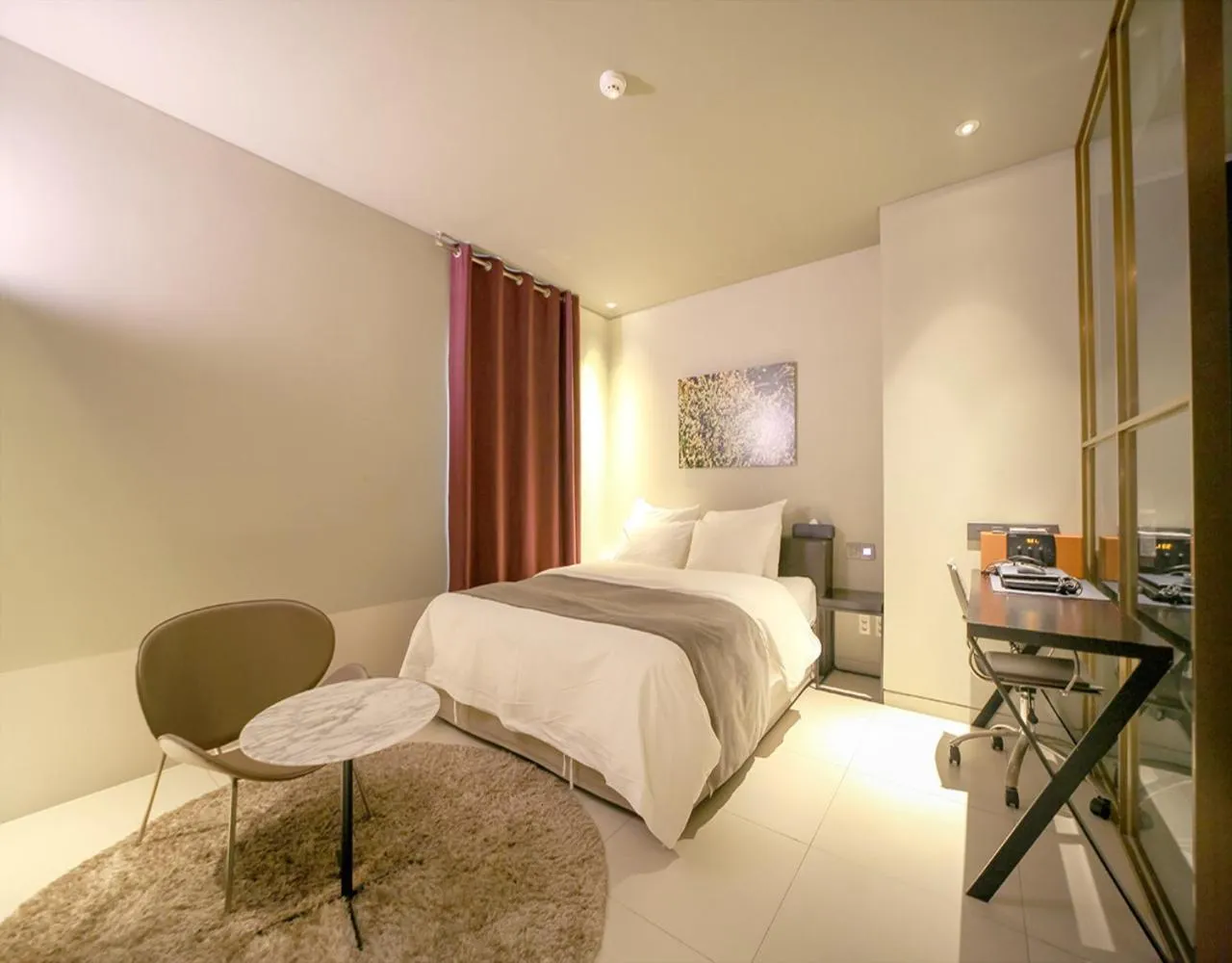 Bed in JS Boutique Hotel