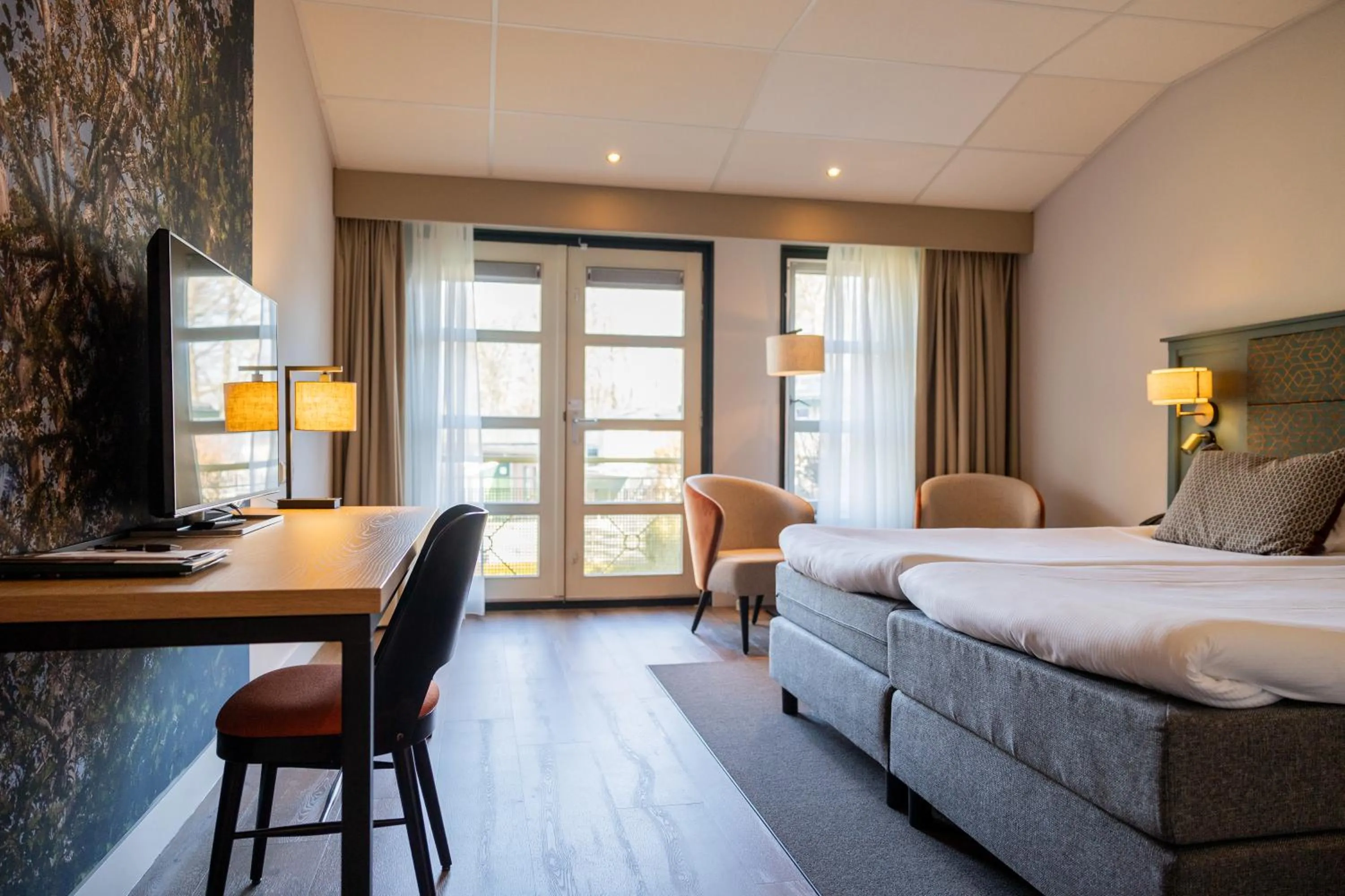 Photo of the whole room, Bed in Parkhotel Tjaarda