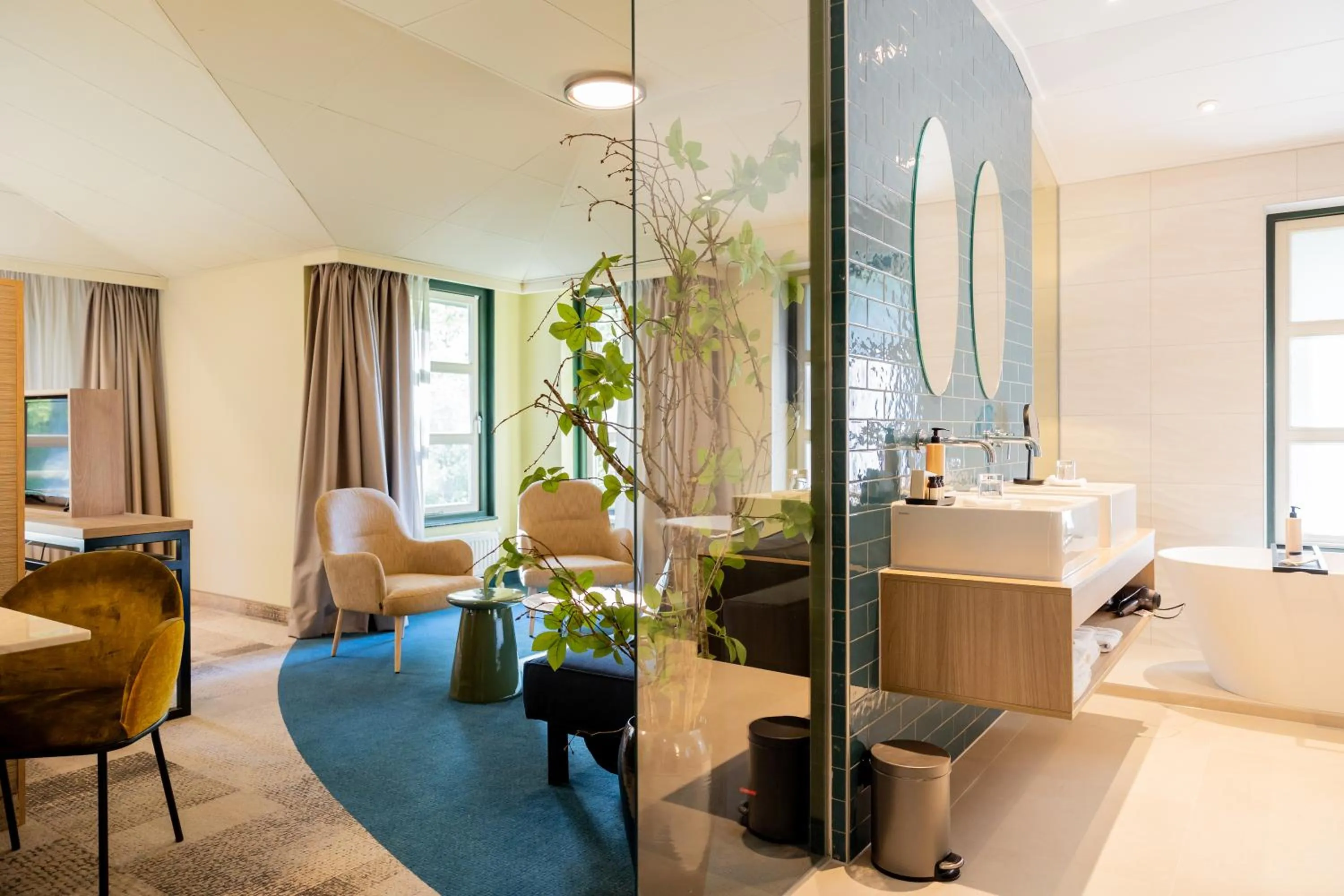 Living room, Bed in Parkhotel Tjaarda